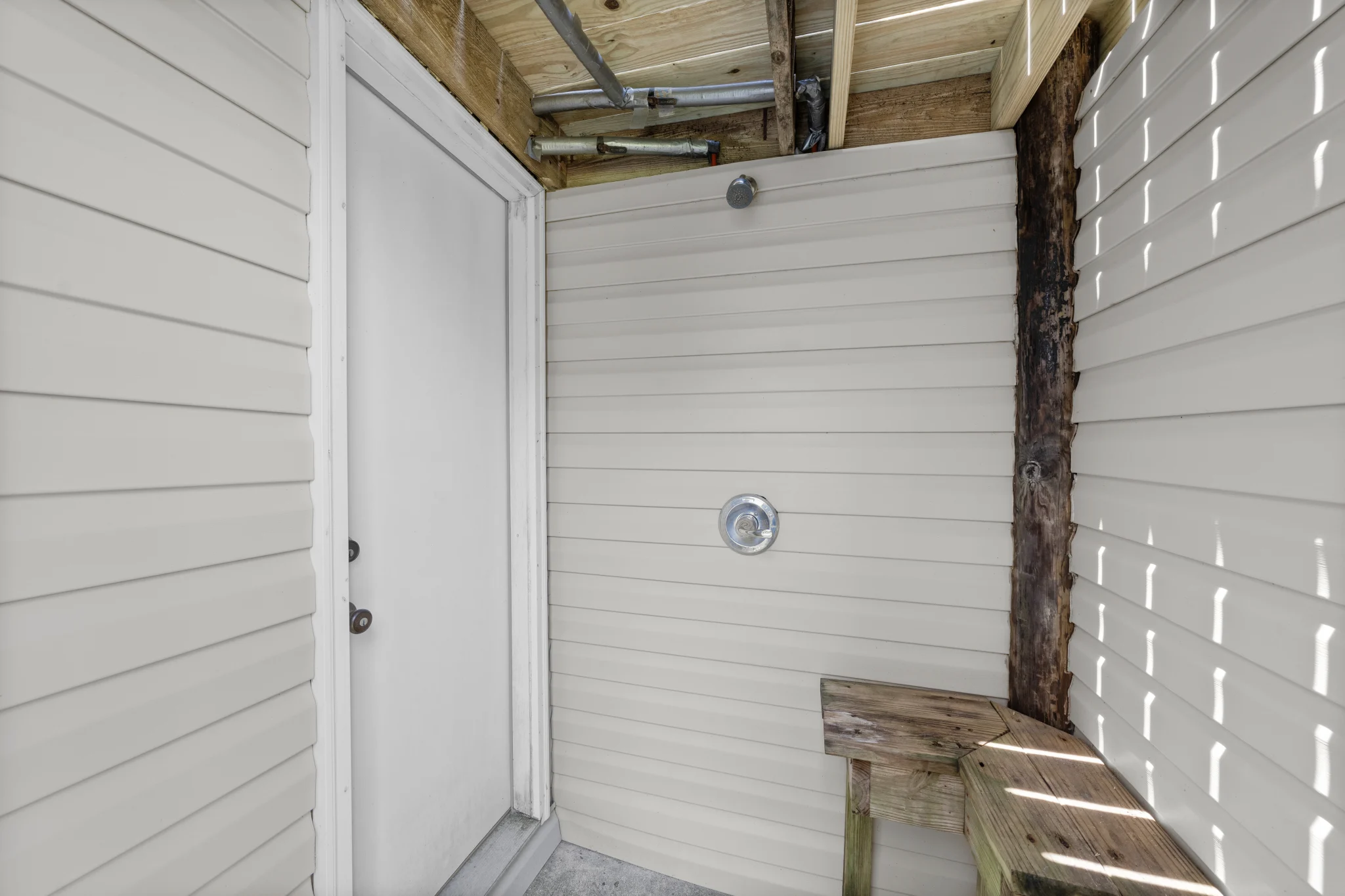 Outdoor shower with bench, Beach Cottage