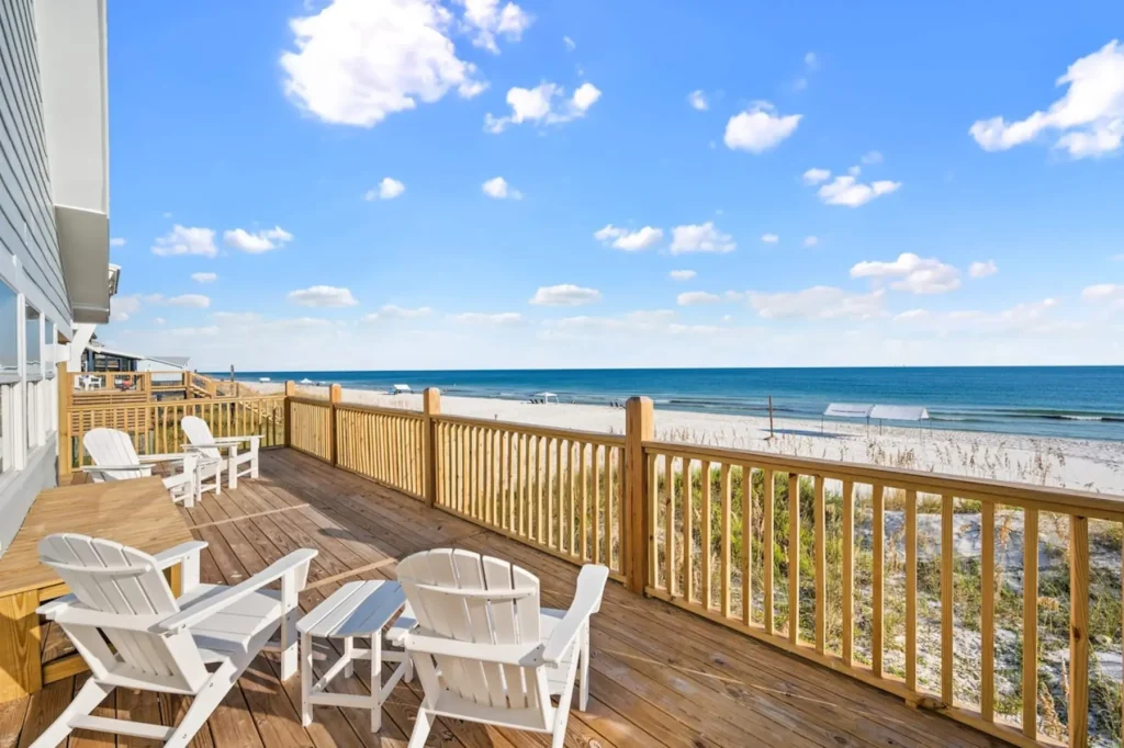 Beachfront deck at Sands of Time with Adirondack chairs