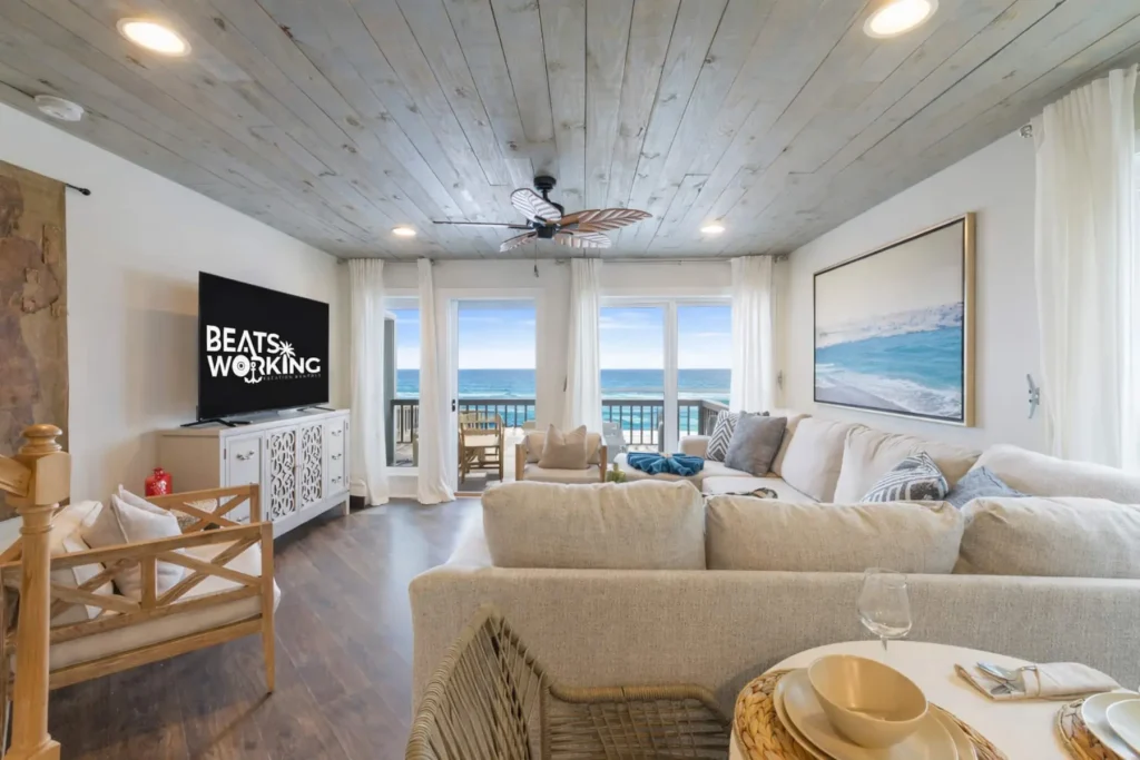 Living room at SouthWind West with Gulf views through the windows