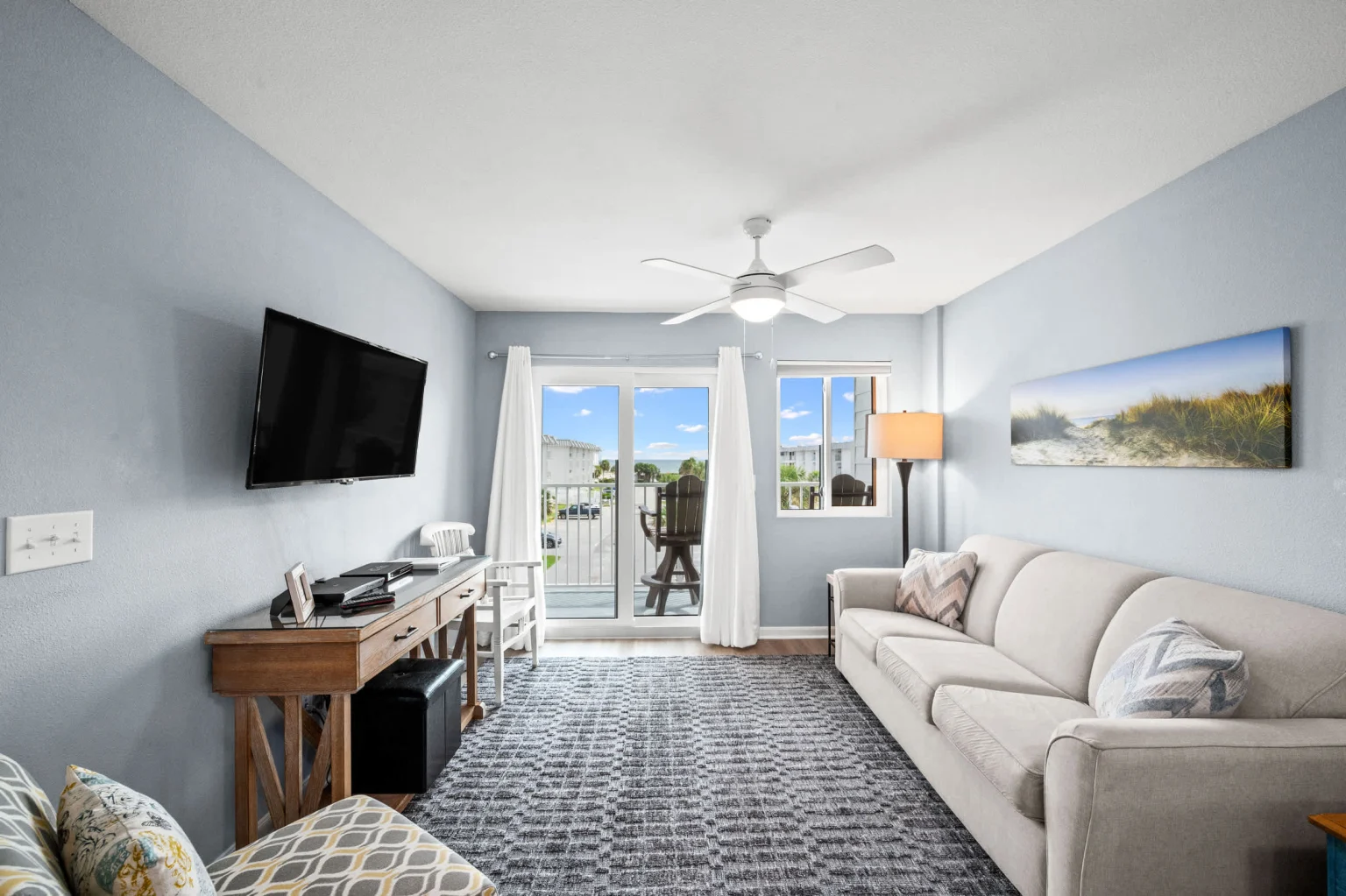 Living room with a sofa, TV and balcony doors, Emerald Dreams