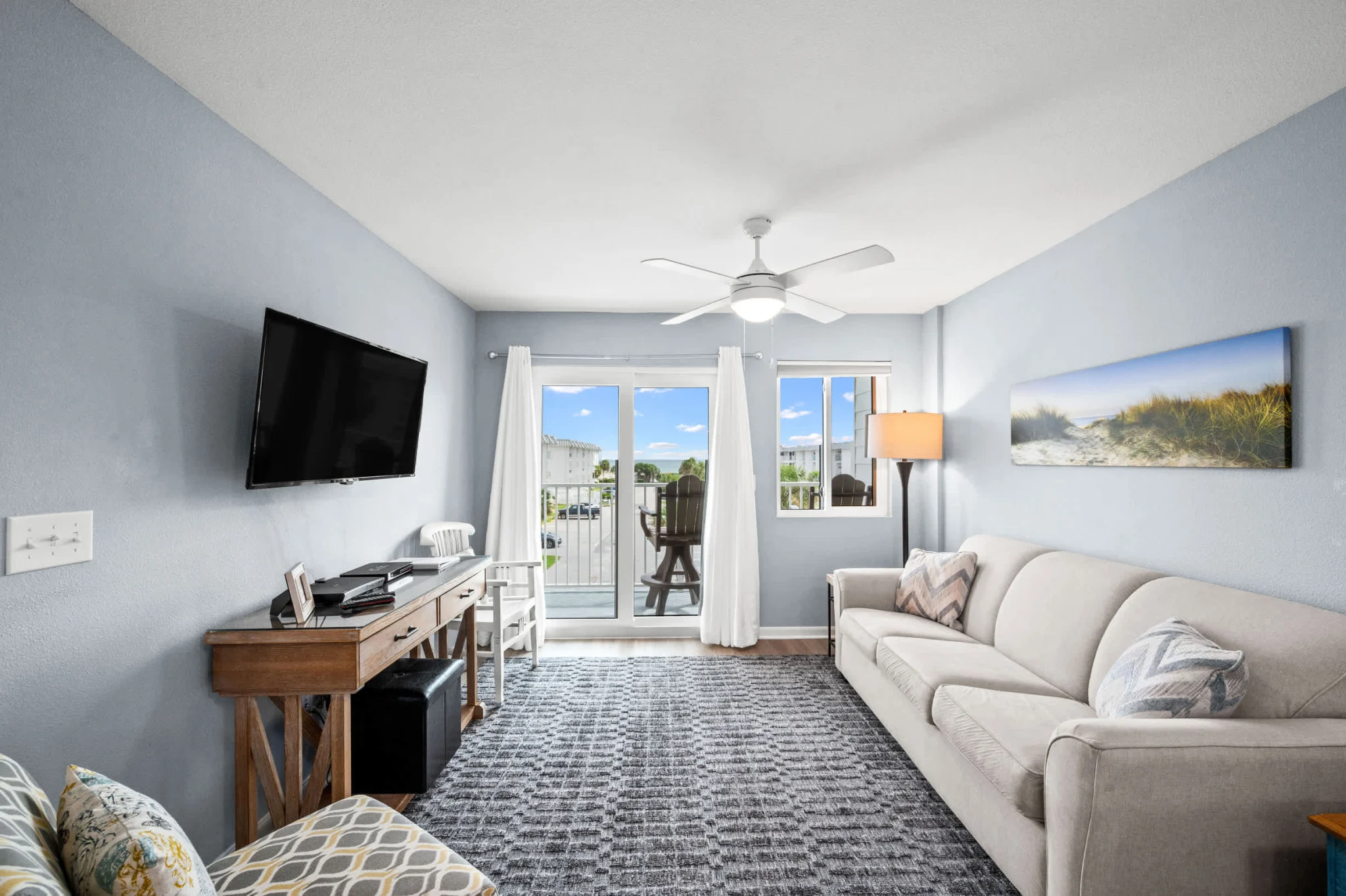 Living room with a sofa, TV and balcony doors, Emerald Dreams