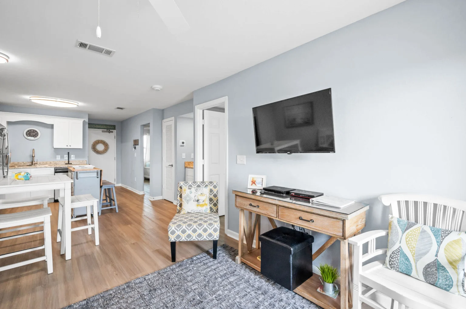 Open living and dining area with the kitchen beyond, Emerald Dreams