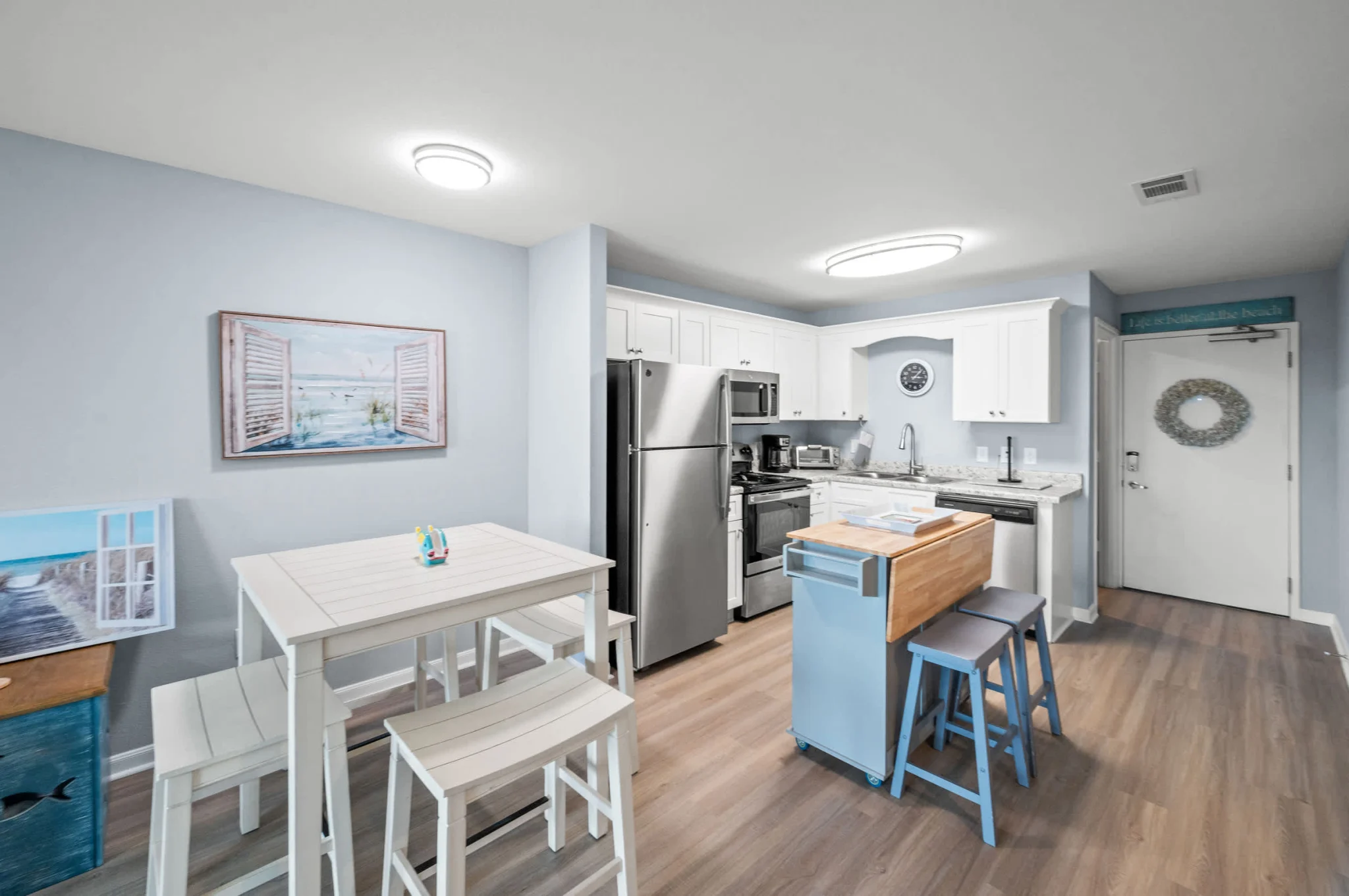 Dining table and kitchen island by the front door, Emerald Dreams