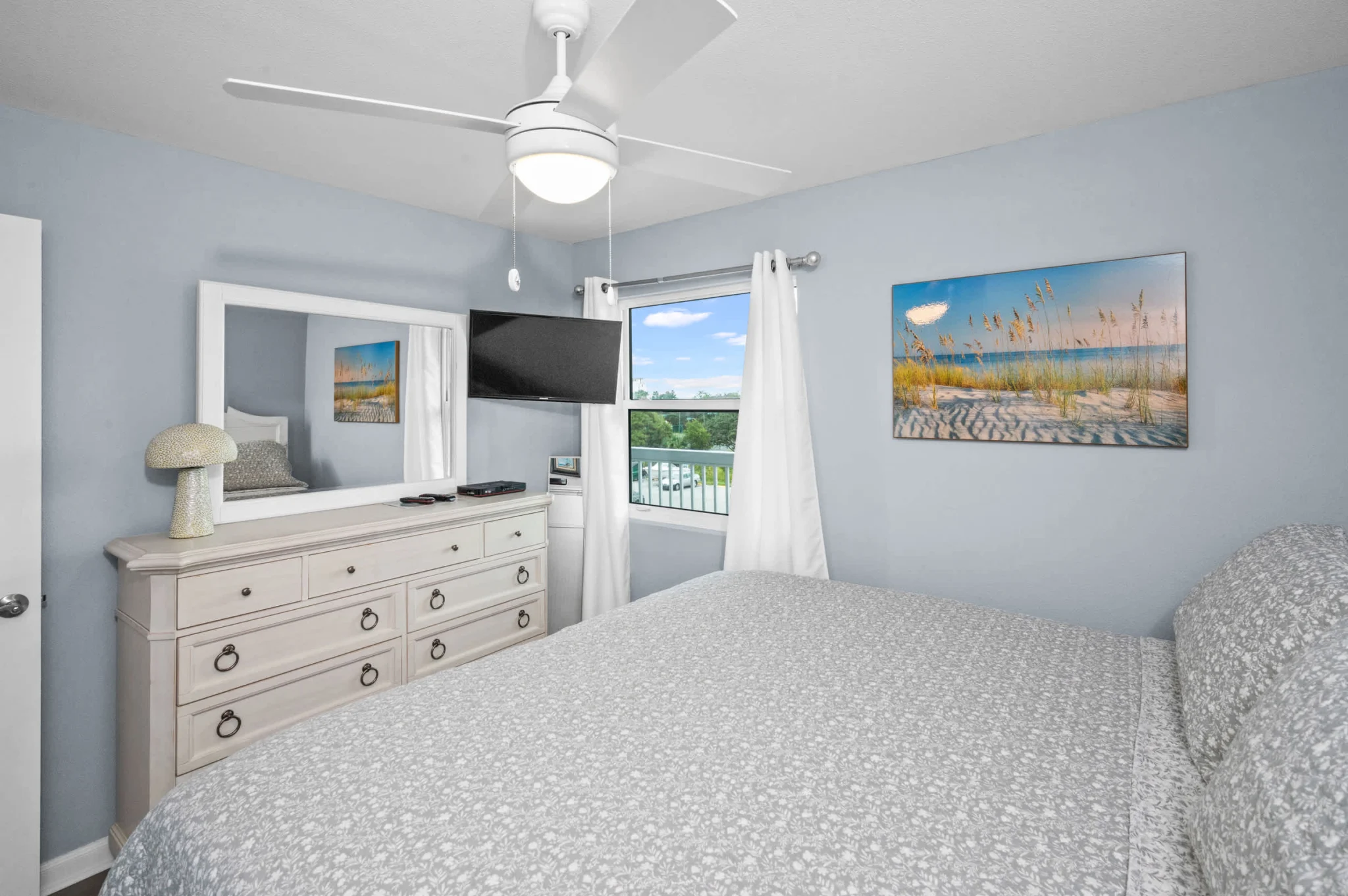 Second bedroom with a dresser and TV, Emerald Dreams