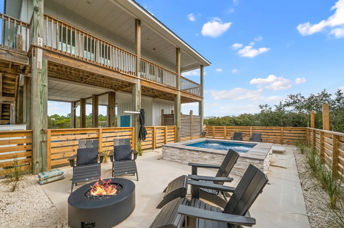 Pool patio with fire pit and lounge chairs, Gulf Pearl