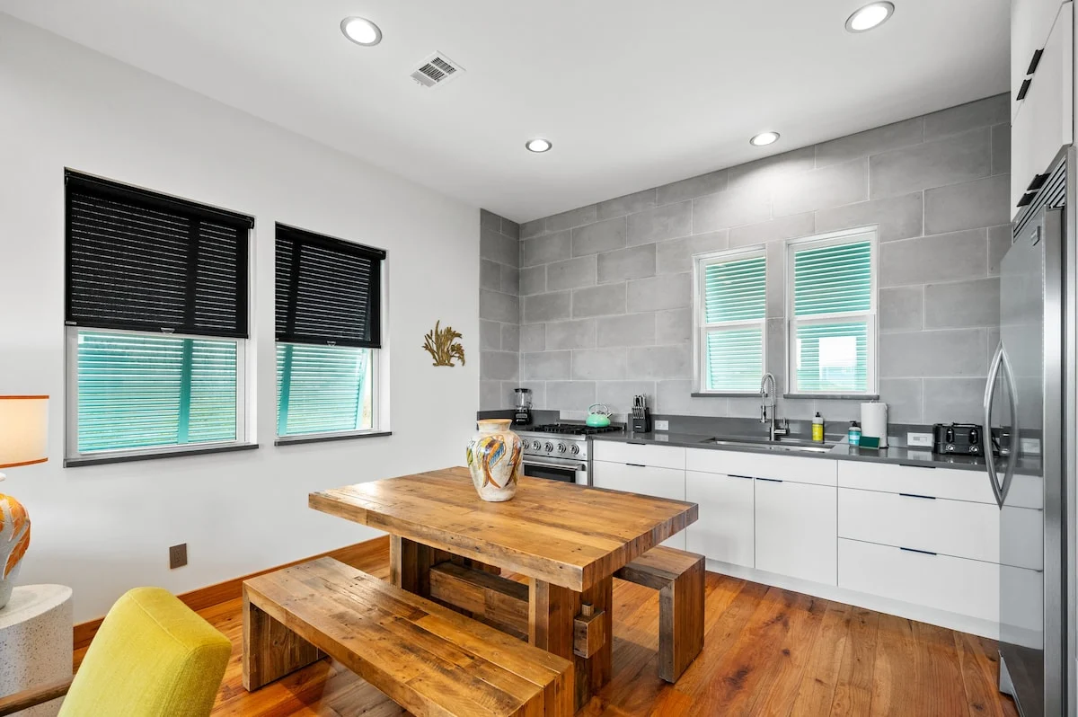 Kitchen with farmhouse dining table and benches, Gulf Pearl