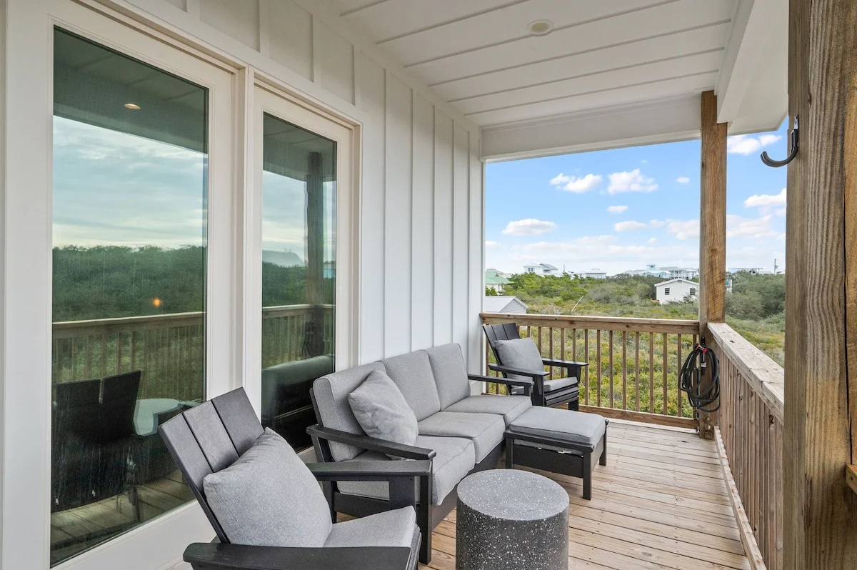 Covered porch with sofa and chairs, Gulf Pearl