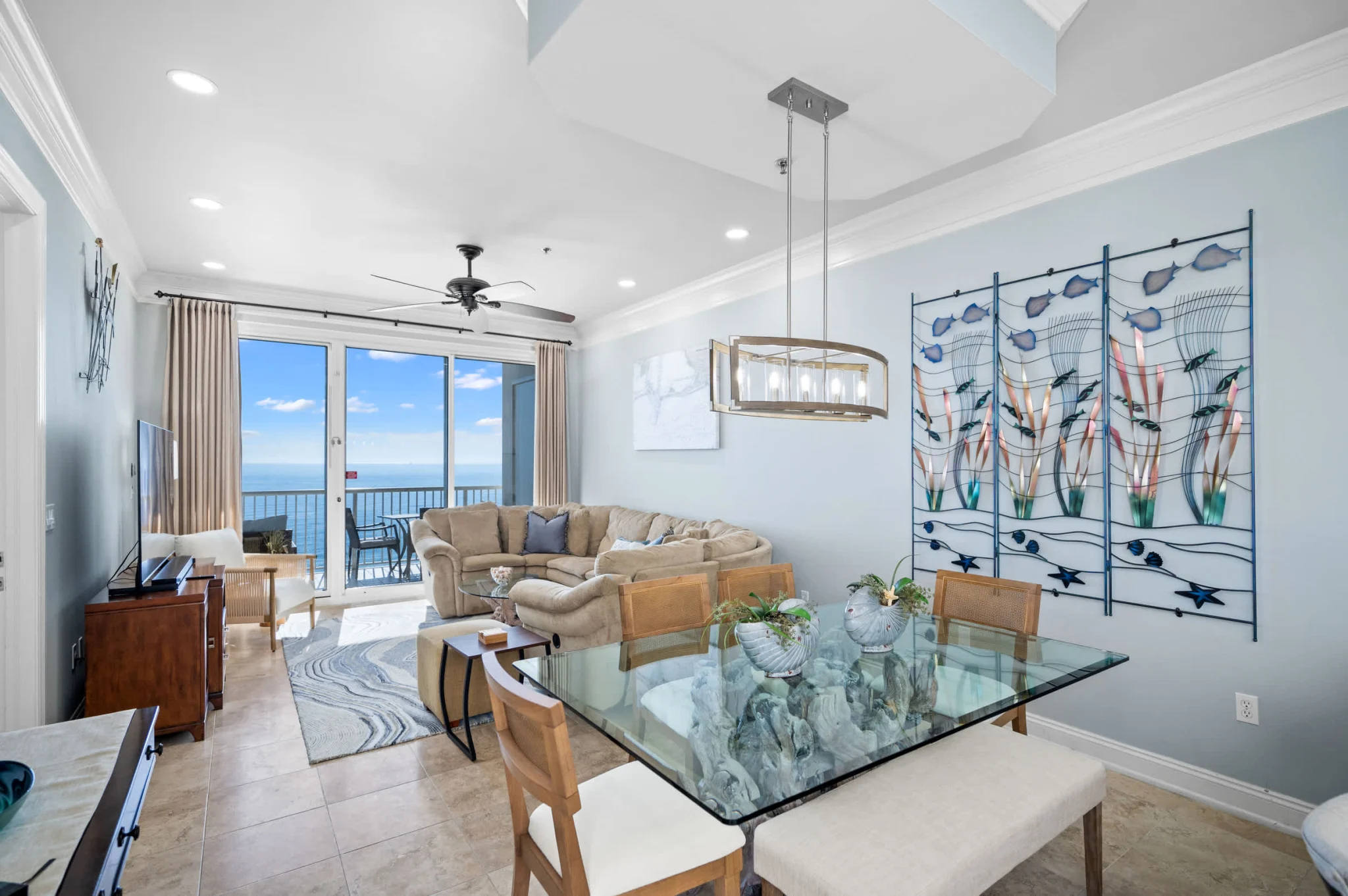 Dining and living room with Gulf-view doors, High Tide Penthouse