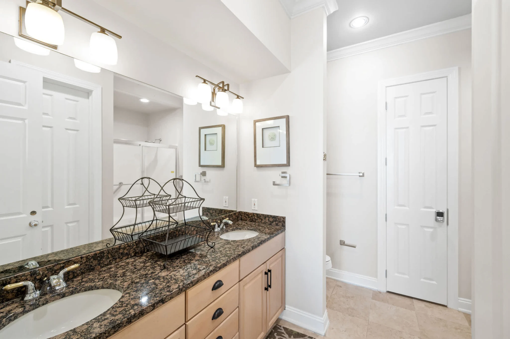 Double vanity in the primary bathroom, High Tide Penthouse