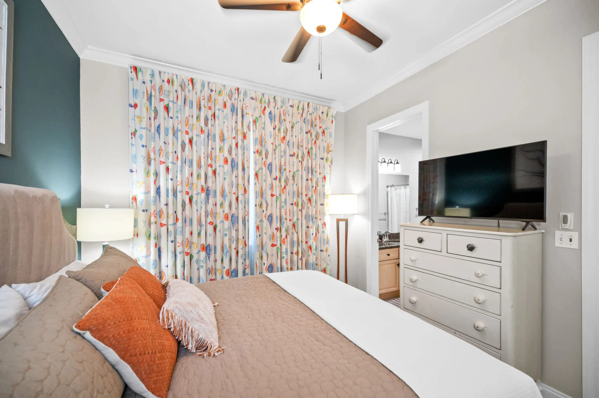 Queen bedroom with TV and dresser, High Tide Penthouse