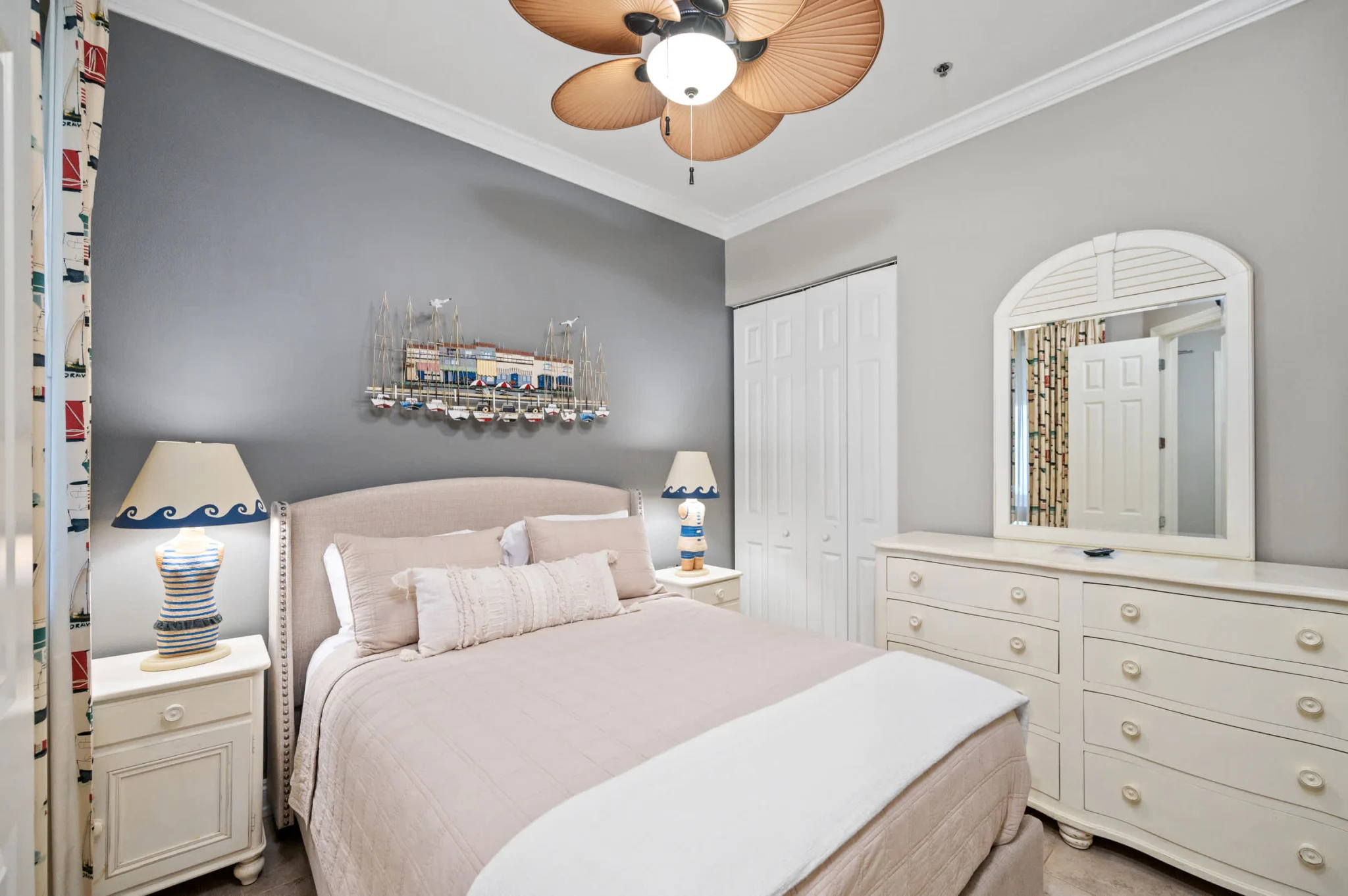 Queen bedroom with white furniture, High Tide Penthouse