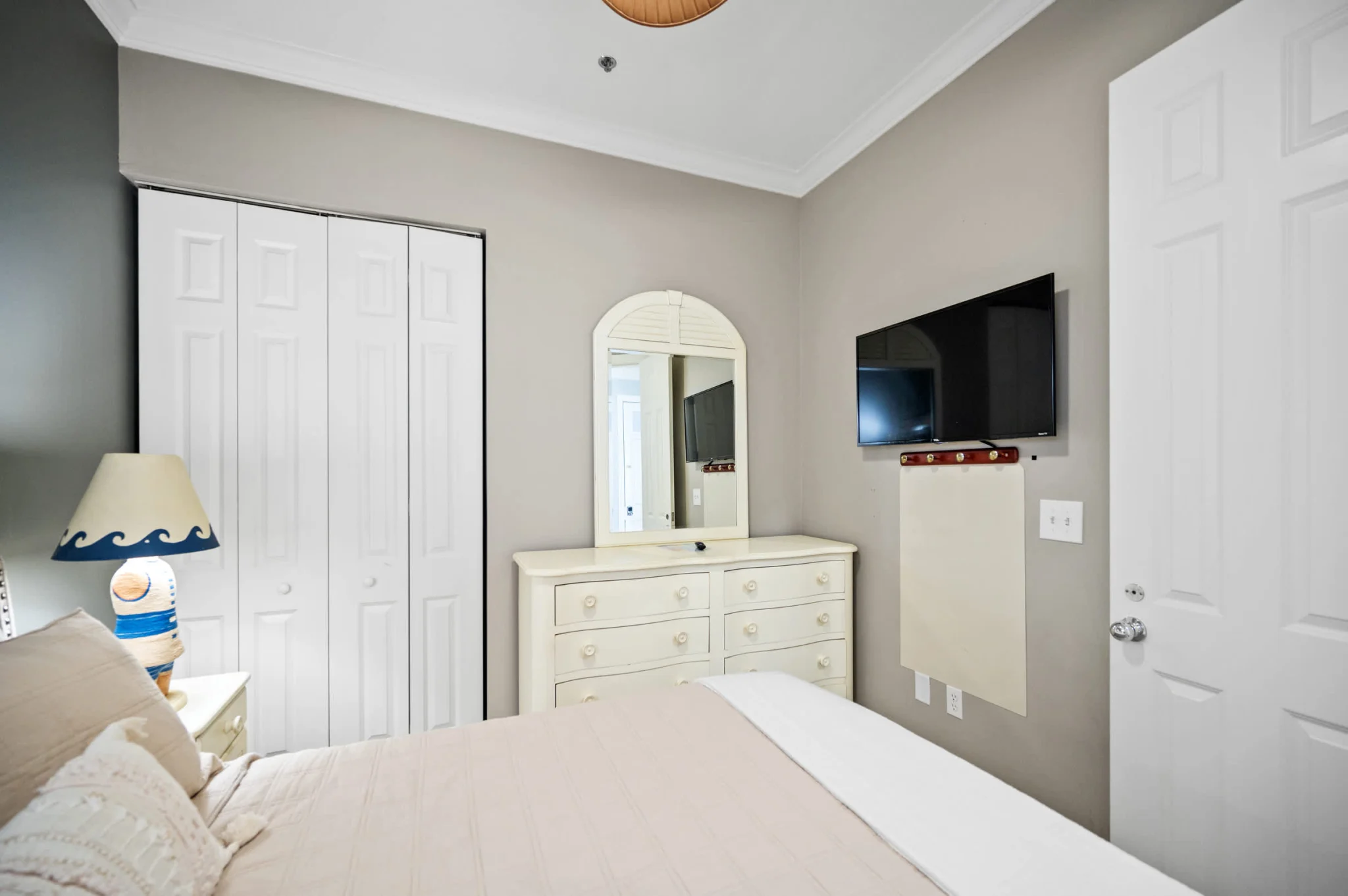 Bedroom with closet and TV, High Tide Penthouse