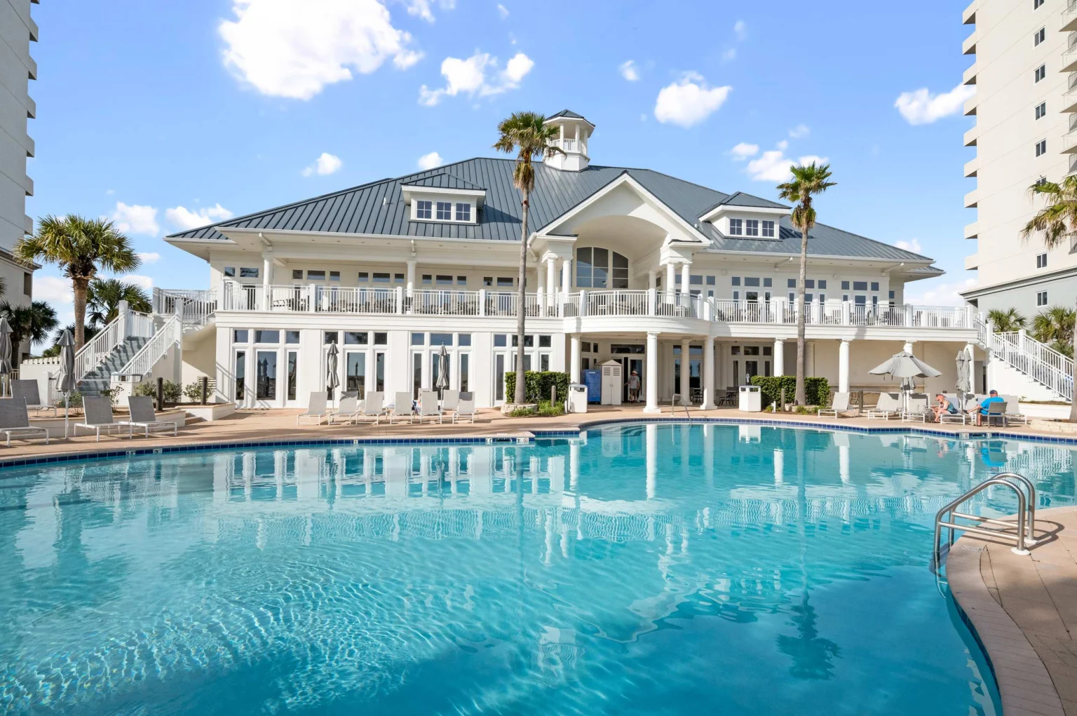Beach Club clubhouse and outdoor pool, High Tide Penthouse