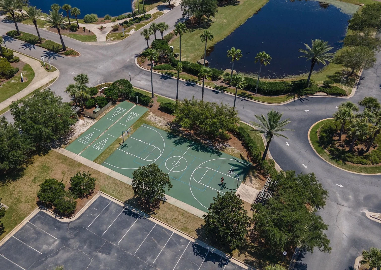 Resort basketball and tennis courts from the air, High Tide Penthouse