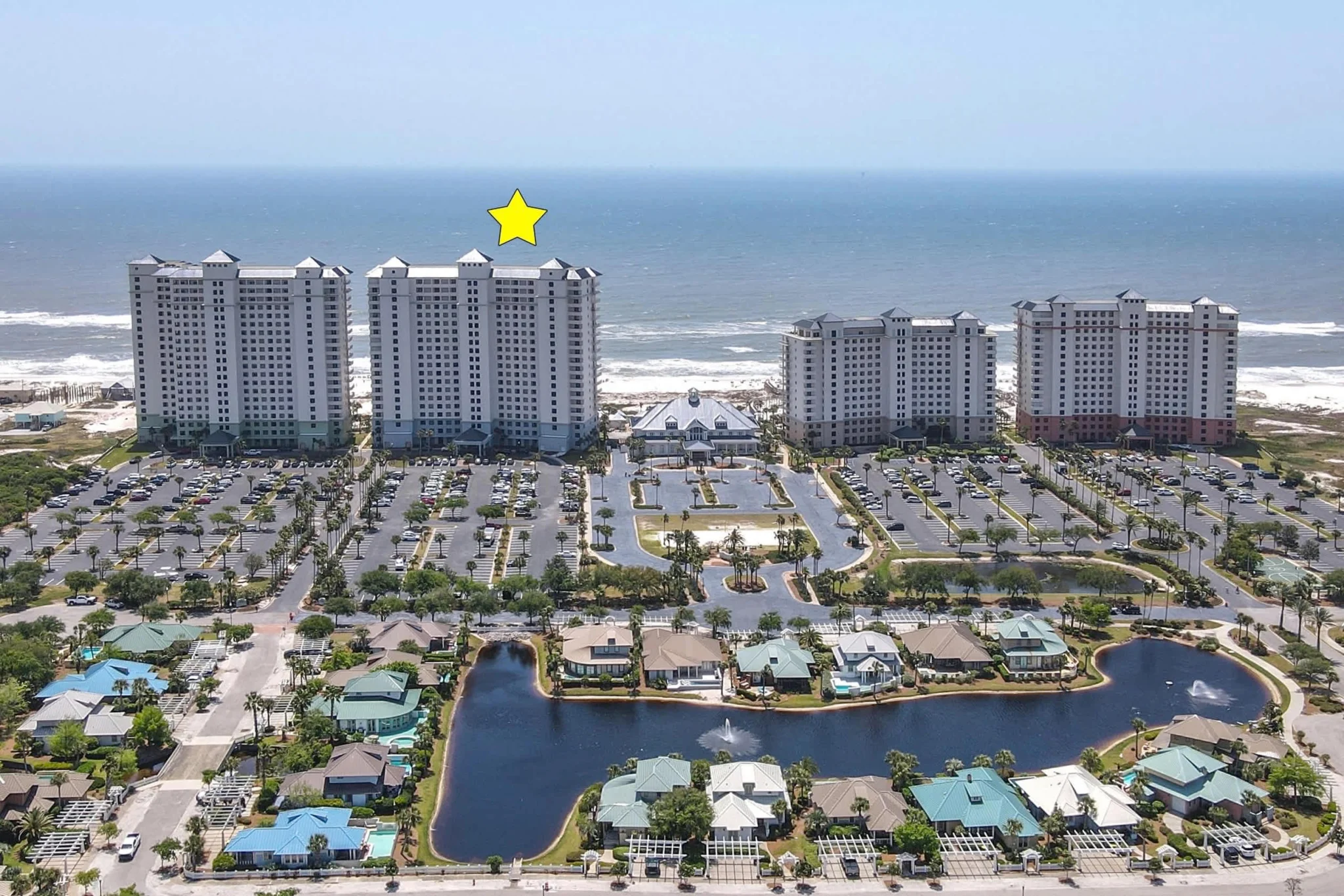 Beach Club towers from the air, the building marked with a star, High Tide Penthouse