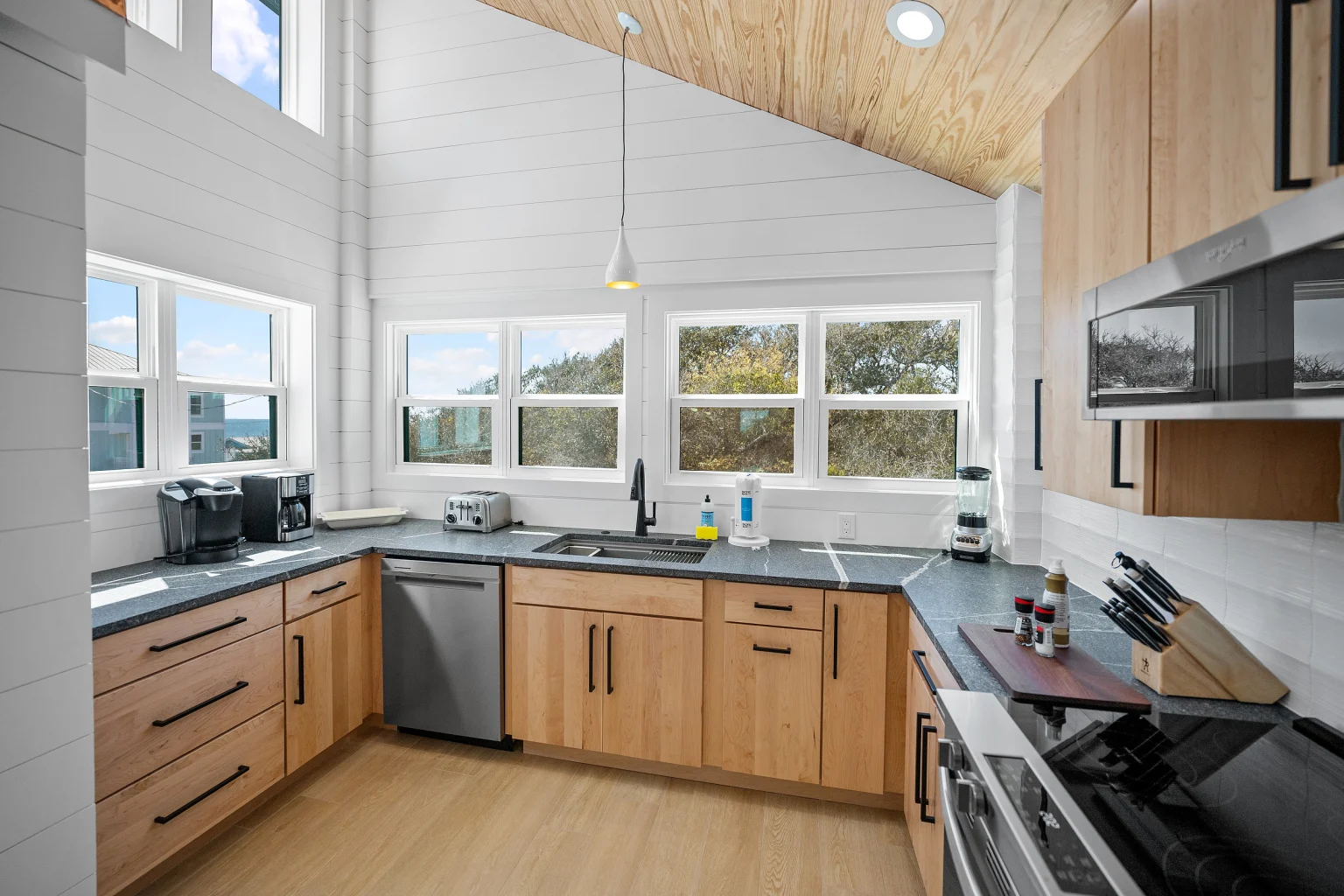 Kitchen with wood cabinets and stainless appliances, Love Shack