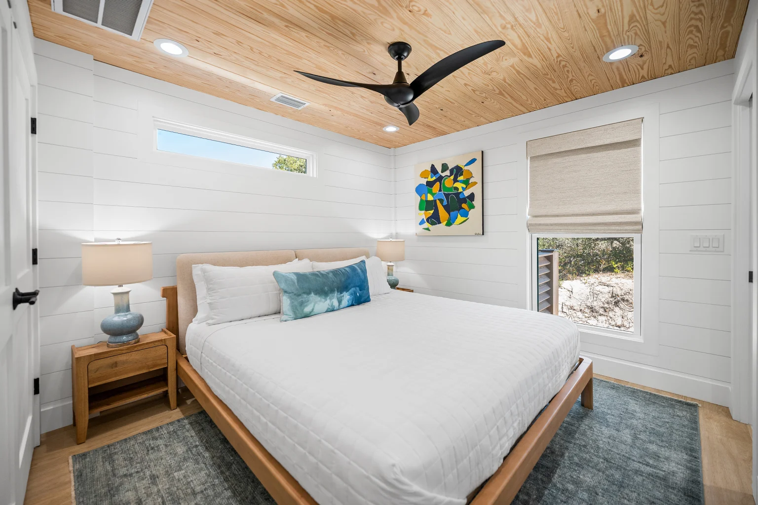 Queen bedroom with blue pillows, Love Shack