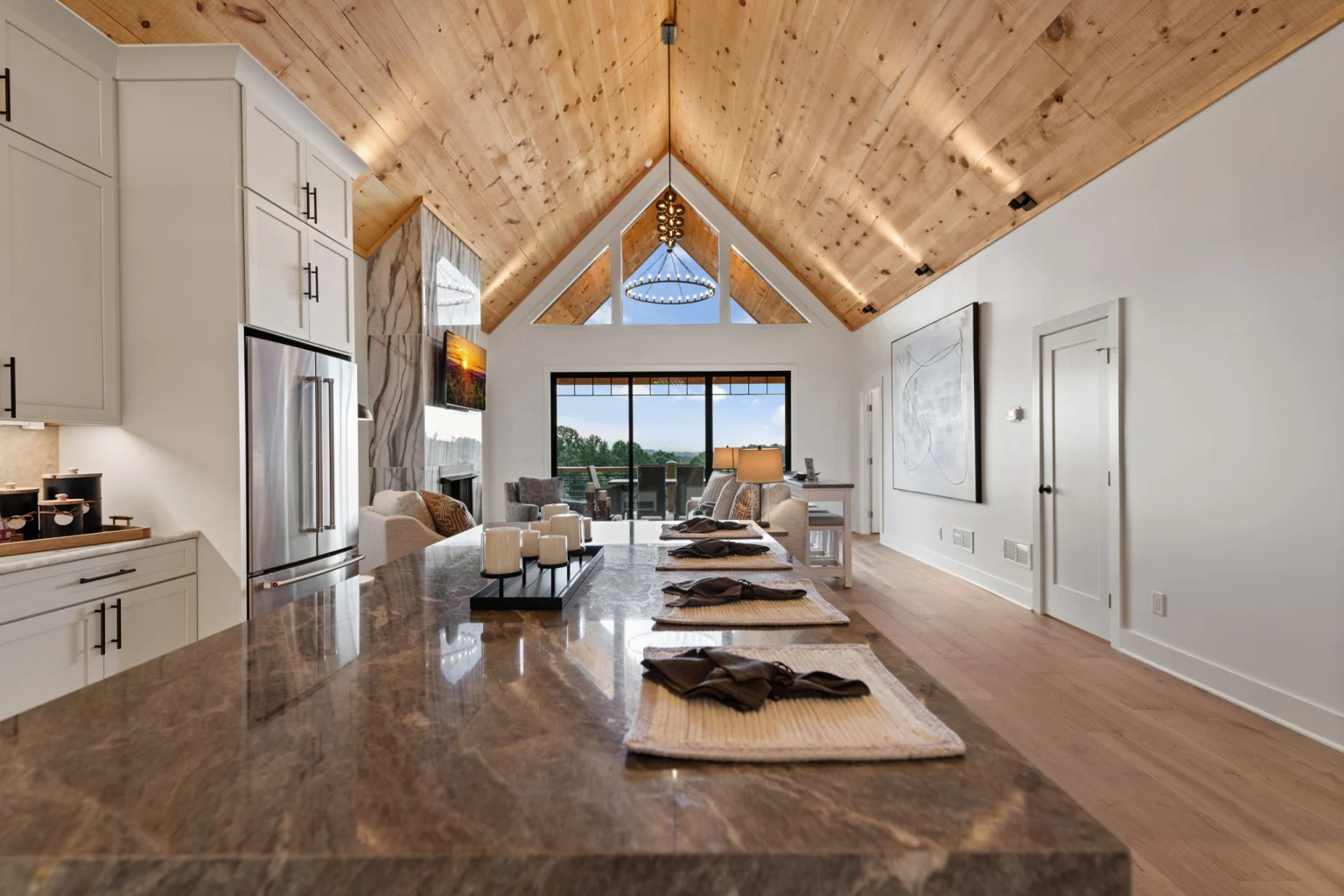 Chef's kitchen with a large stone island, Modern Overlook