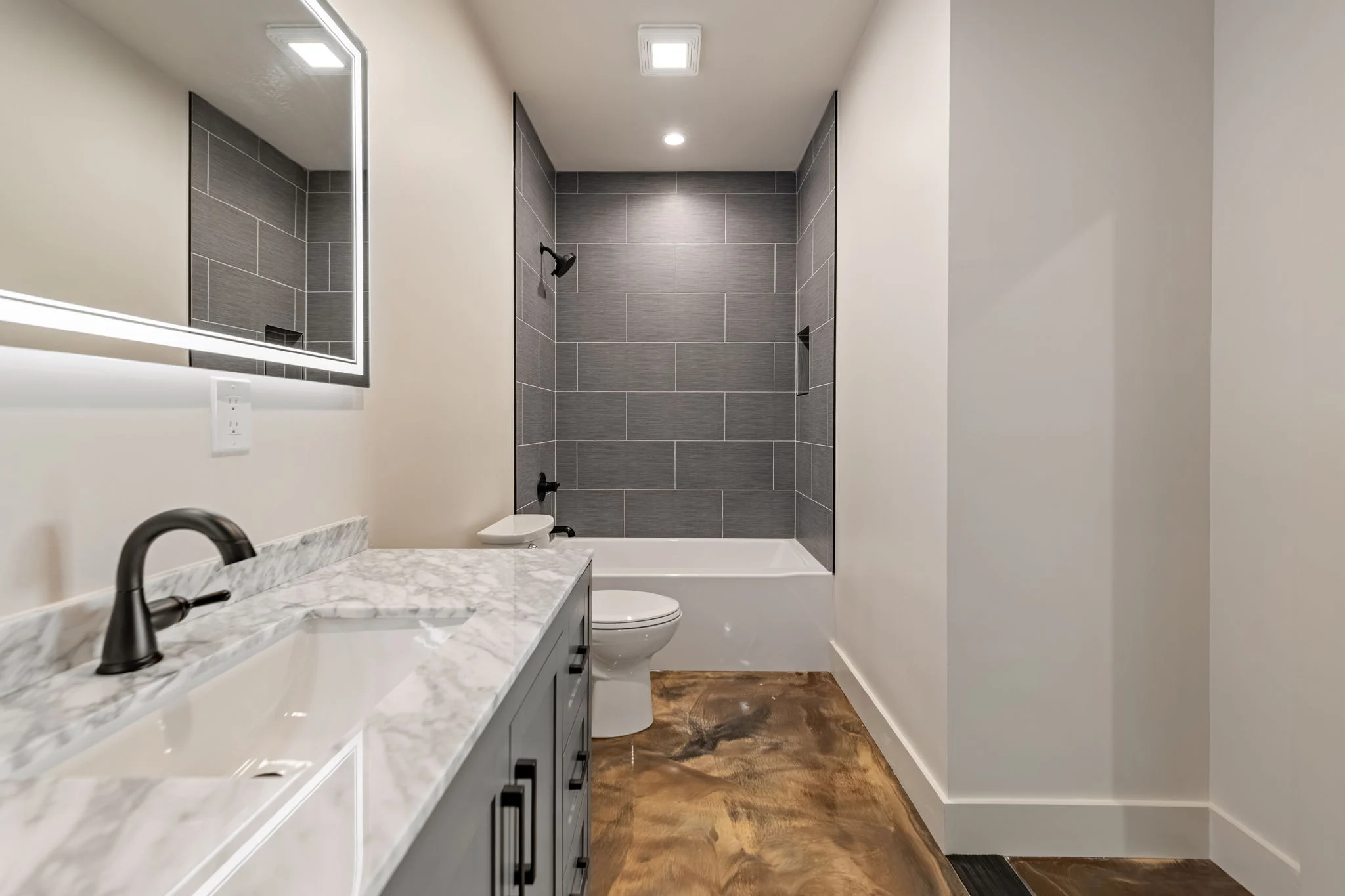 Terrace-level bathroom with a double vanity, Modern Overlook