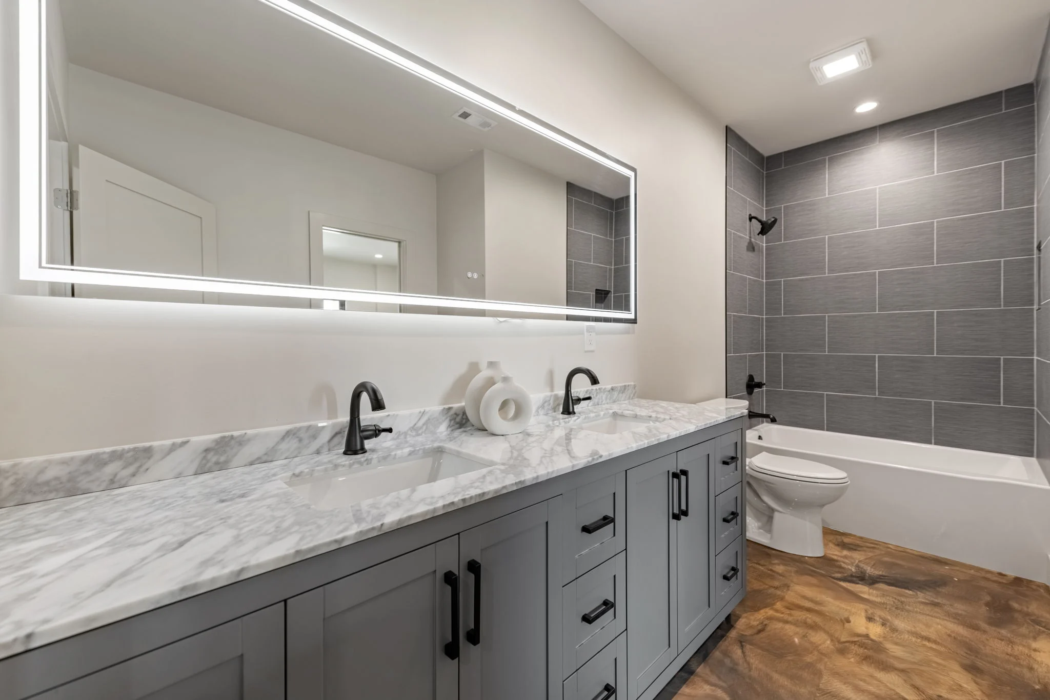 Terrace-level bathroom with a double vanity, Modern Overlook