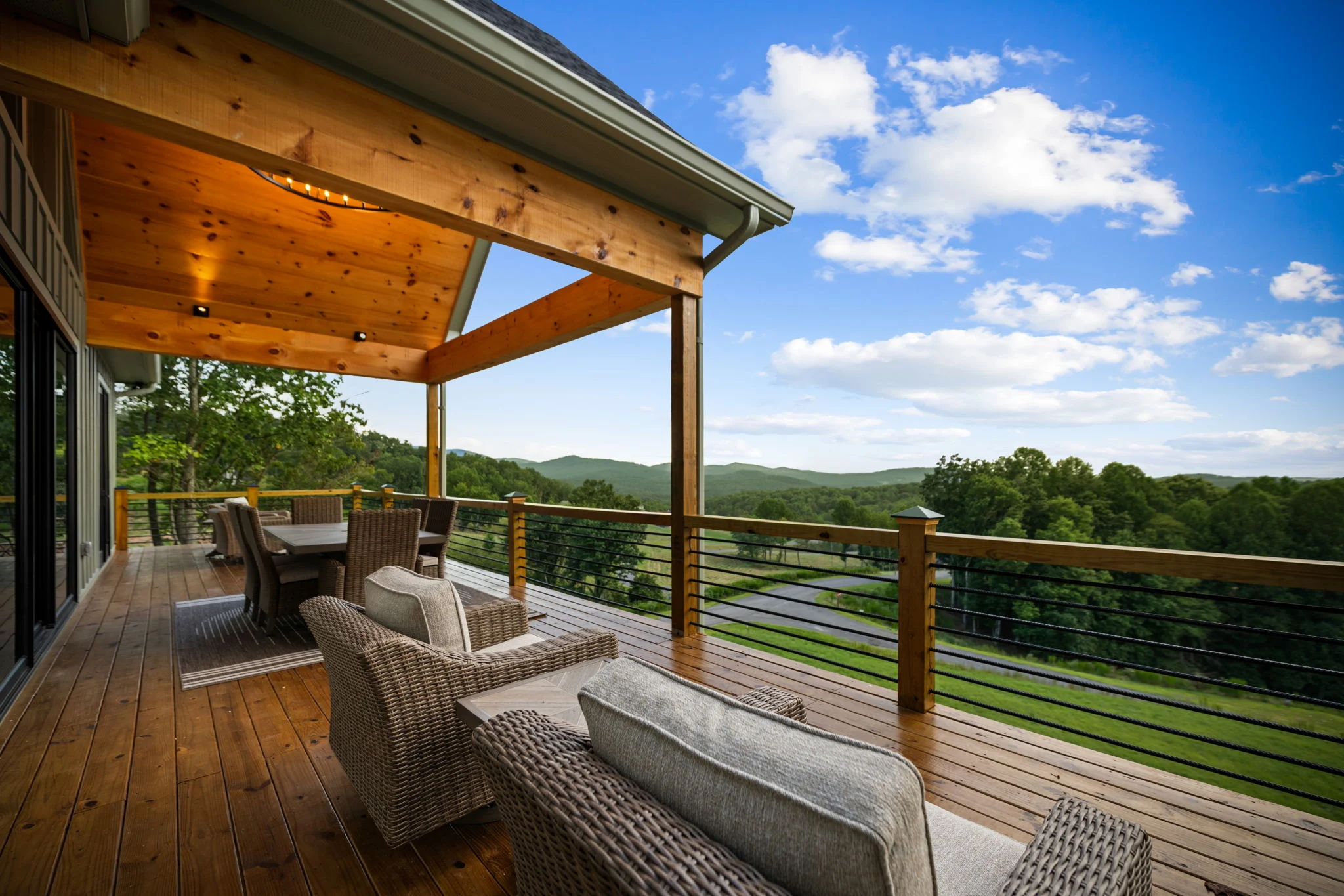 Covered deck with seating and mountain views, Modern Overlook
