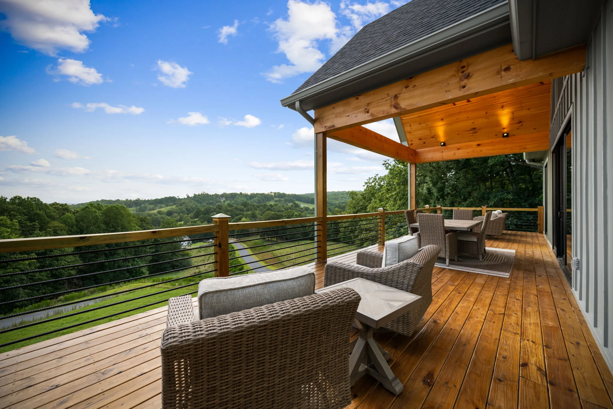 Covered deck with seating and mountain views, Modern Overlook