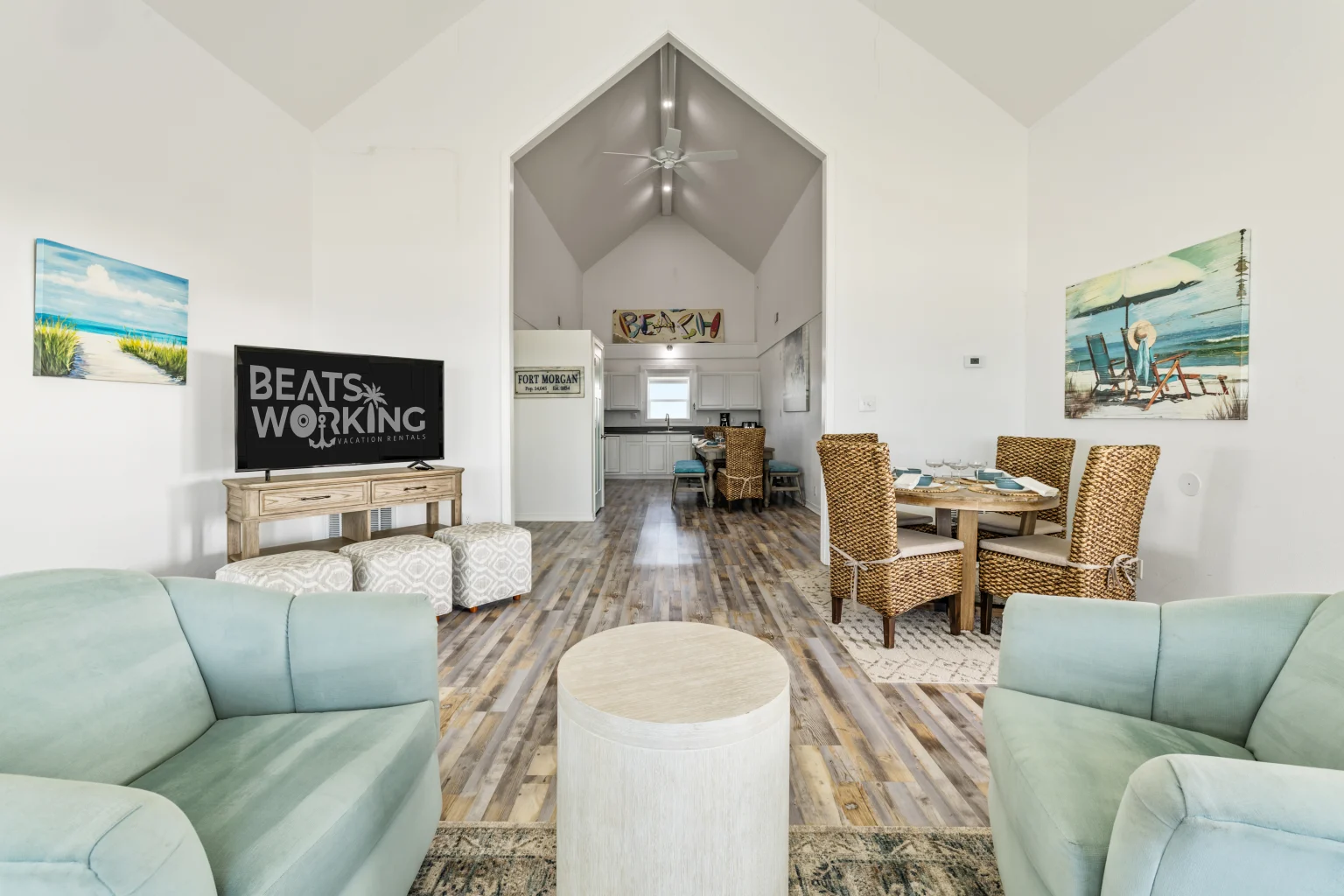 Living room toward the kitchen under a vaulted ceiling, Sands of Time