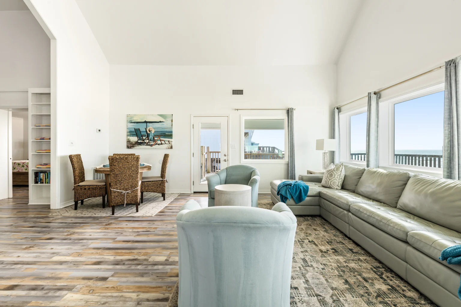 Sectional sofa and dining area with Gulf-view windows, Sands of Time