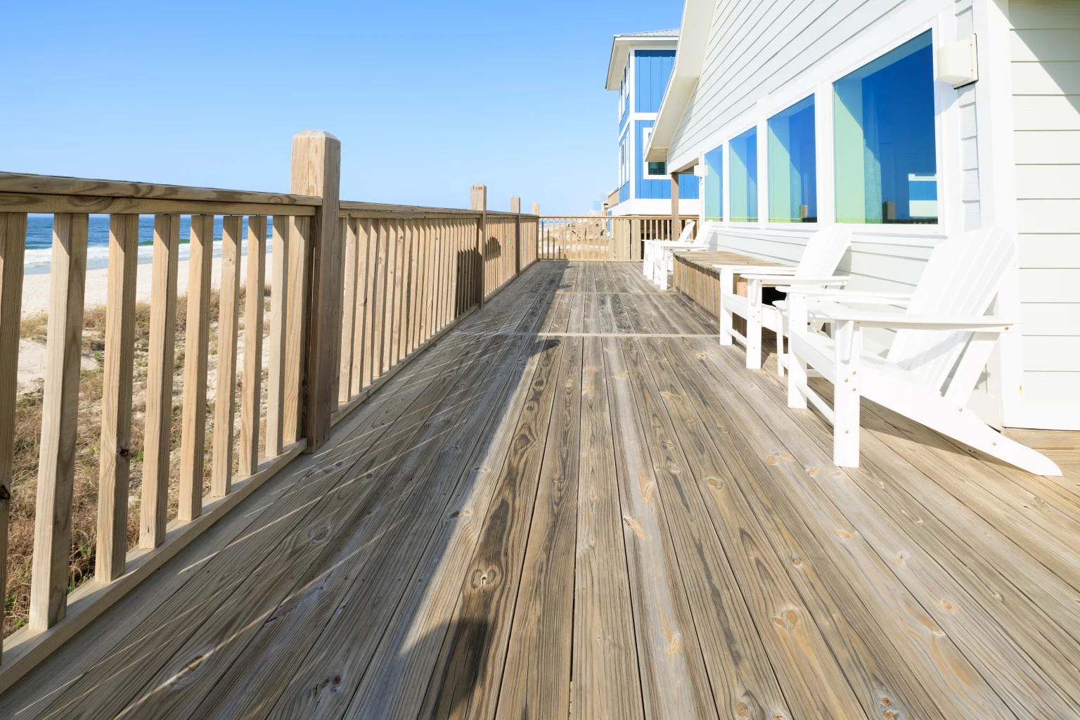 Deck with Adirondack chairs, Sands of Time