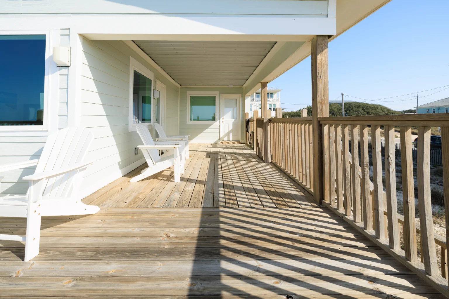 Covered porch with rocking chairs, Sands of Time