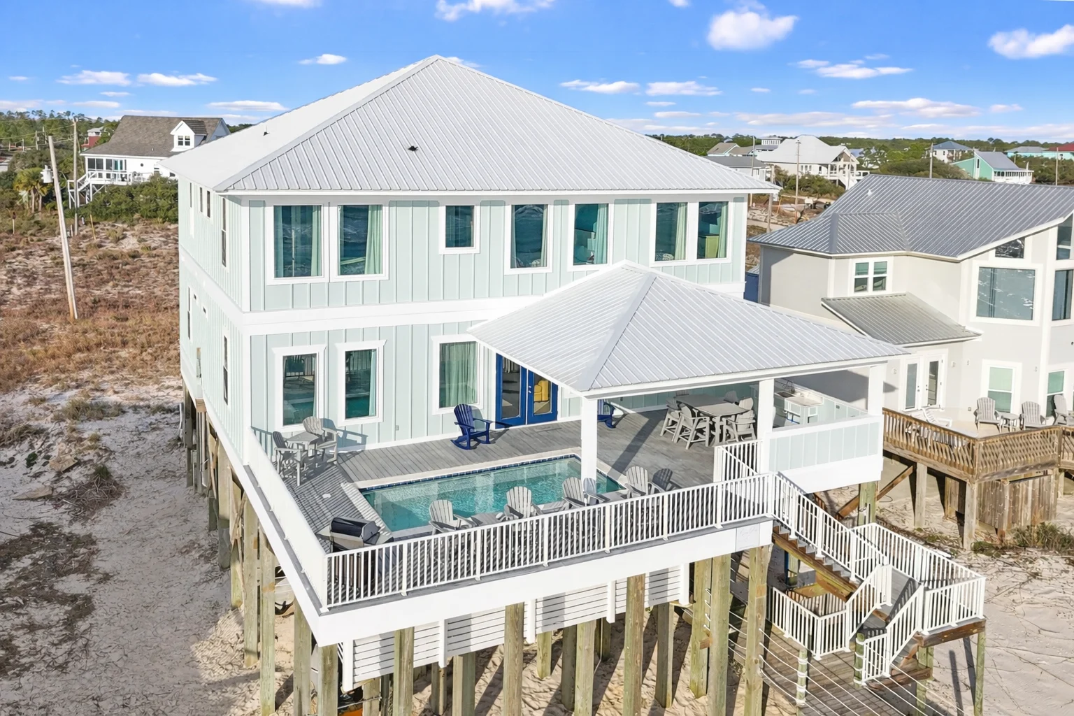 Beachfront house from the air, pool deck facing the dunes, Sea Bliss