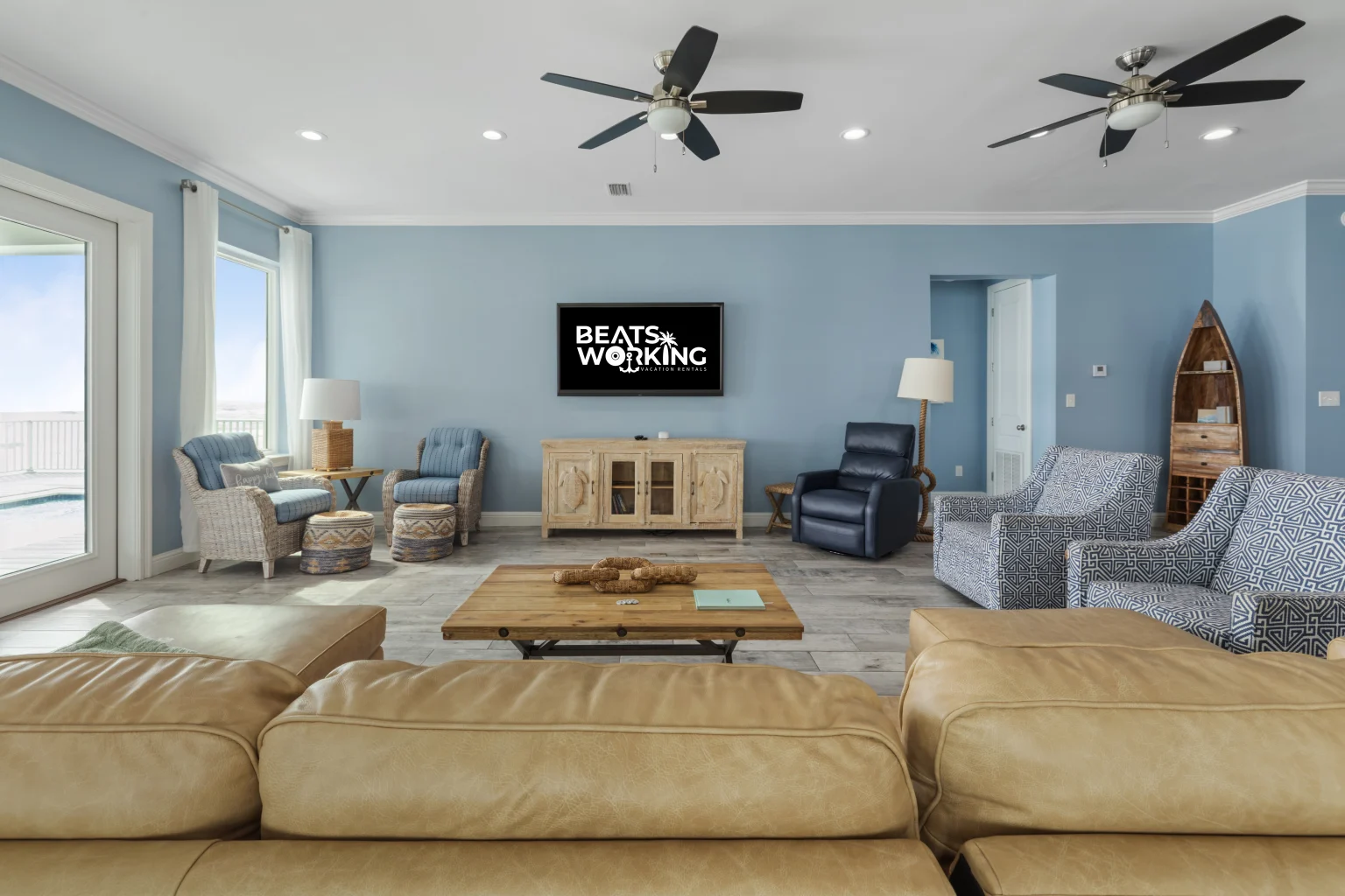 Living room with a large sectional and armchairs, Sea Bliss