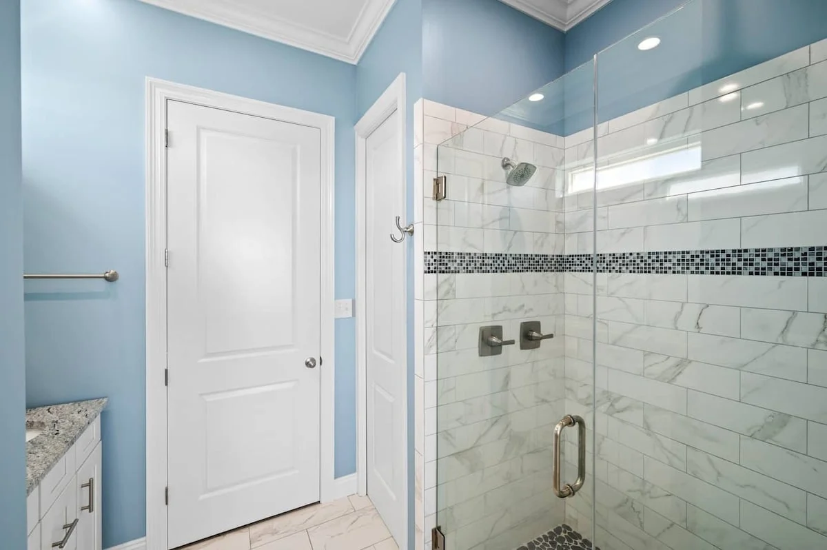 Walk-in tiled shower with glass door, Sea Bliss