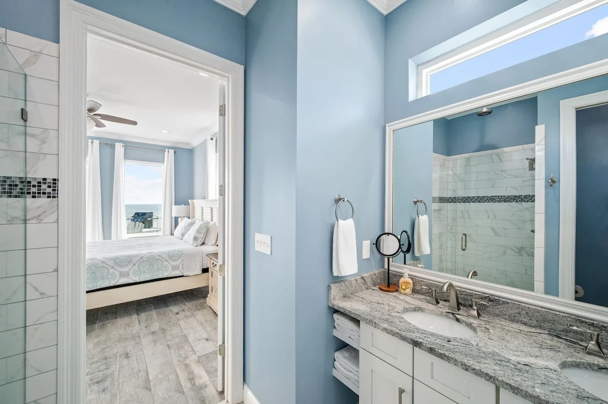 En-suite bathroom with a view back to the bedroom, Sea Bliss
