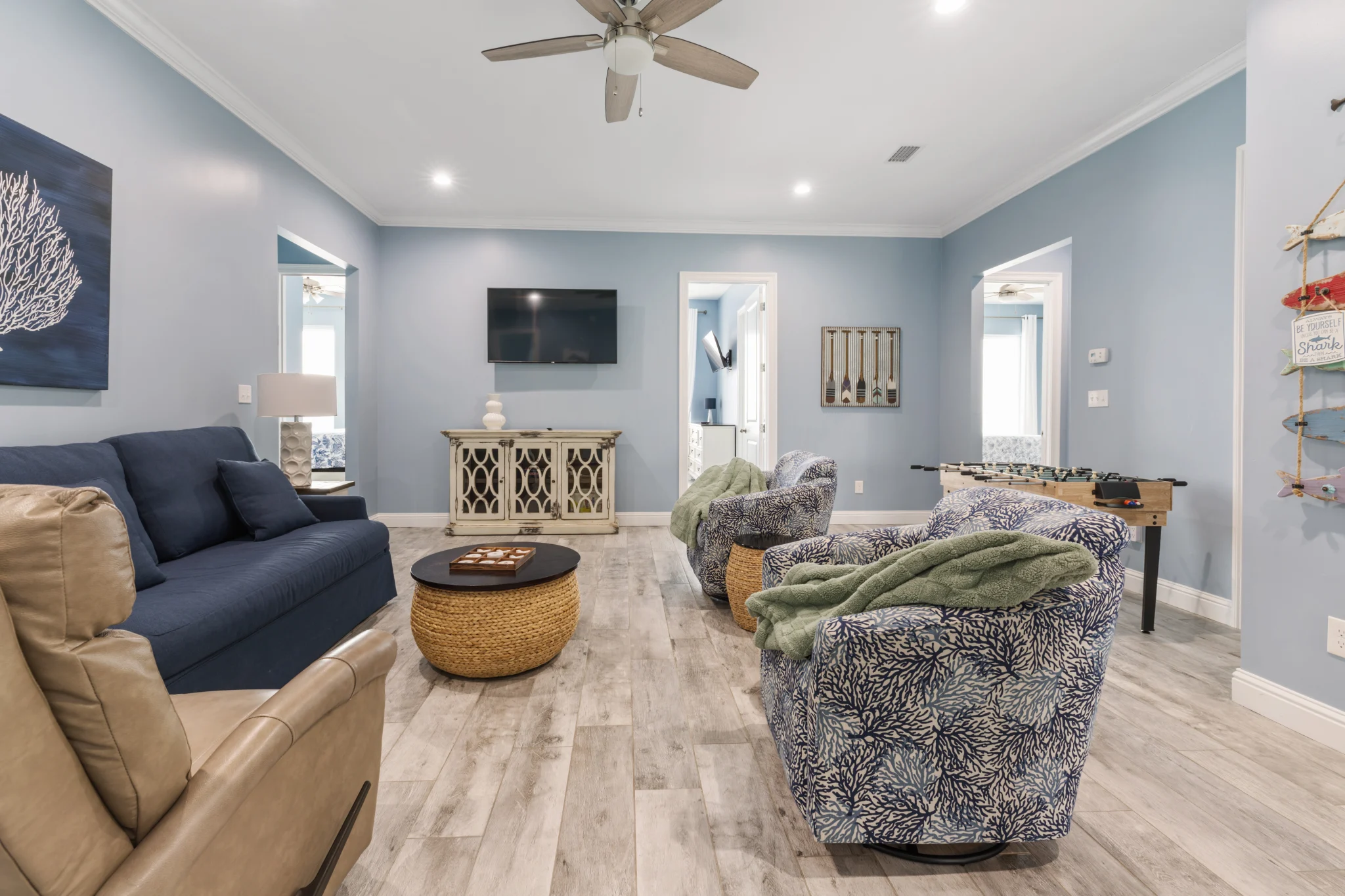 Upstairs lounge with sofa and armchairs, Sea Bliss