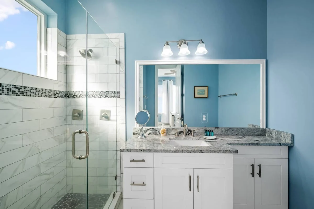 En-suite bathroom with glass shower and vanity, Sea Bliss