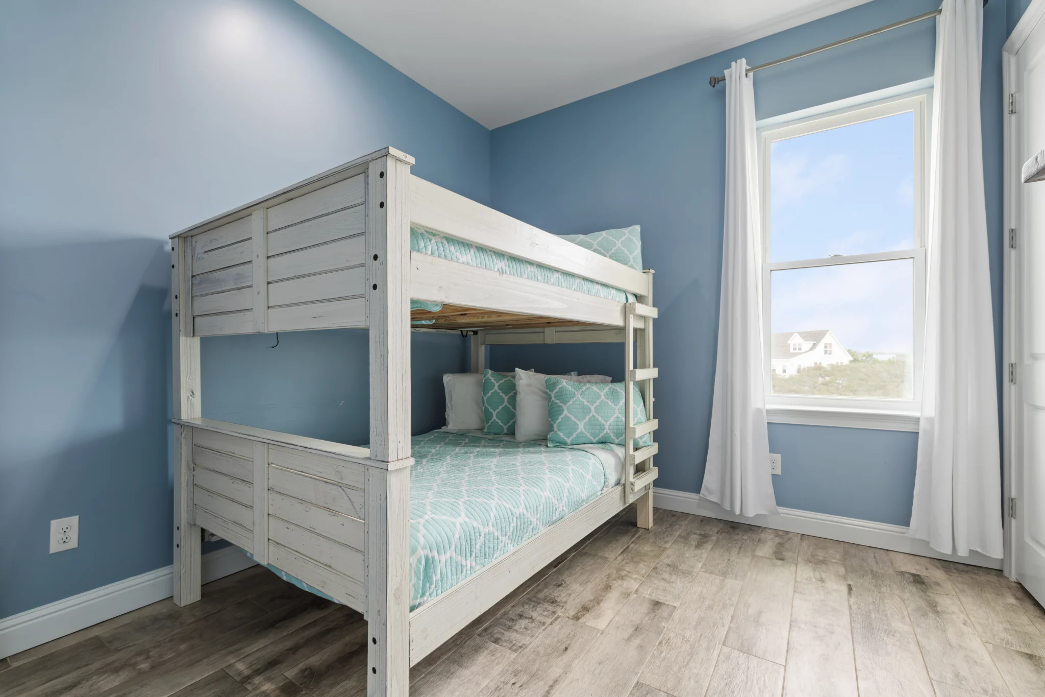 Full-over-full bunk bed by the window, Sea Bliss