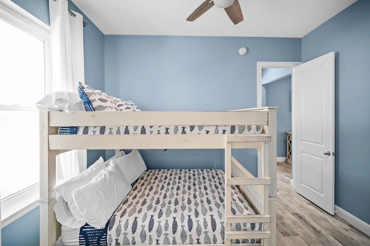 Bunk room with fish-print bedding, Sea Bliss
