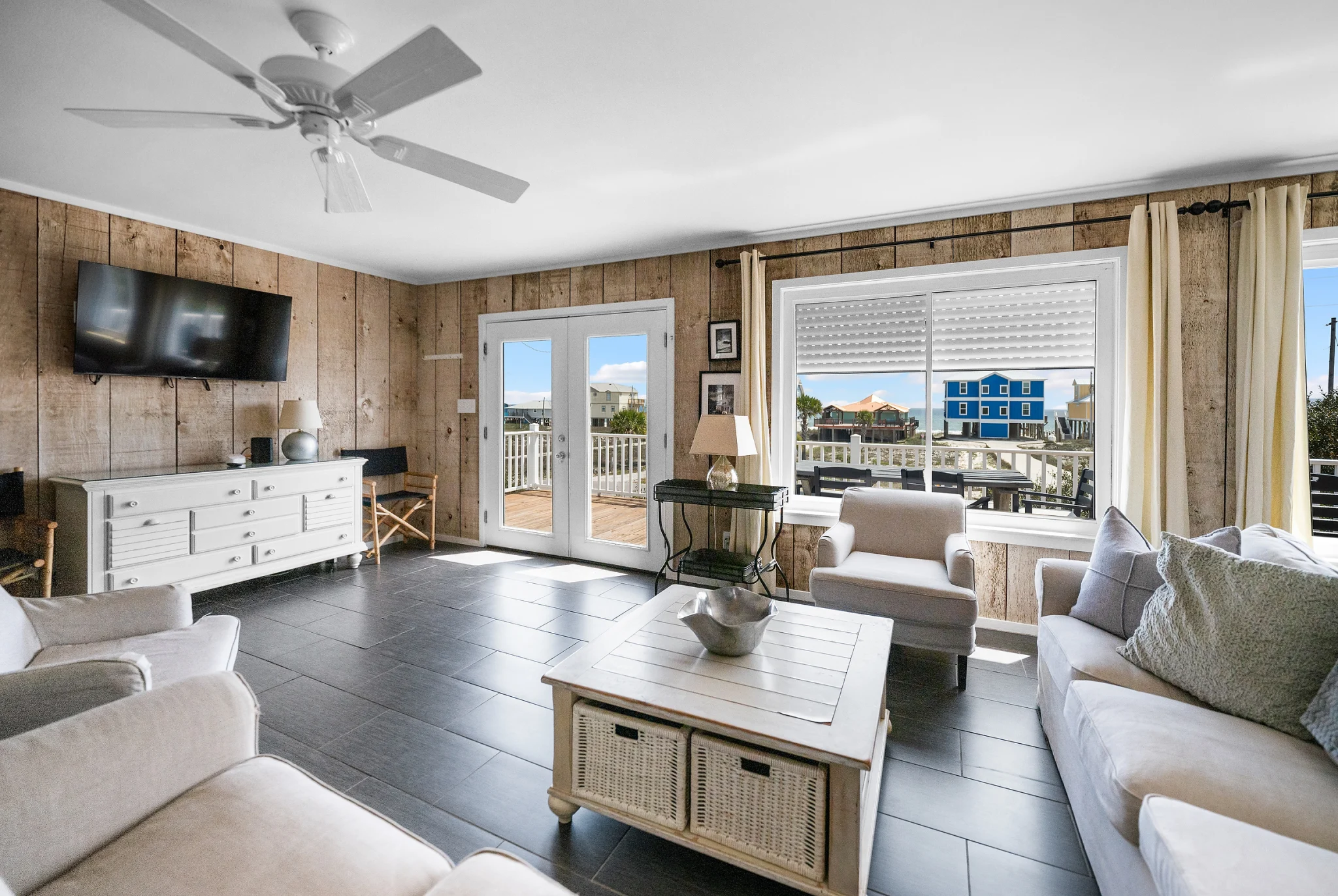 Living room with wood-plank walls, Sea Forever