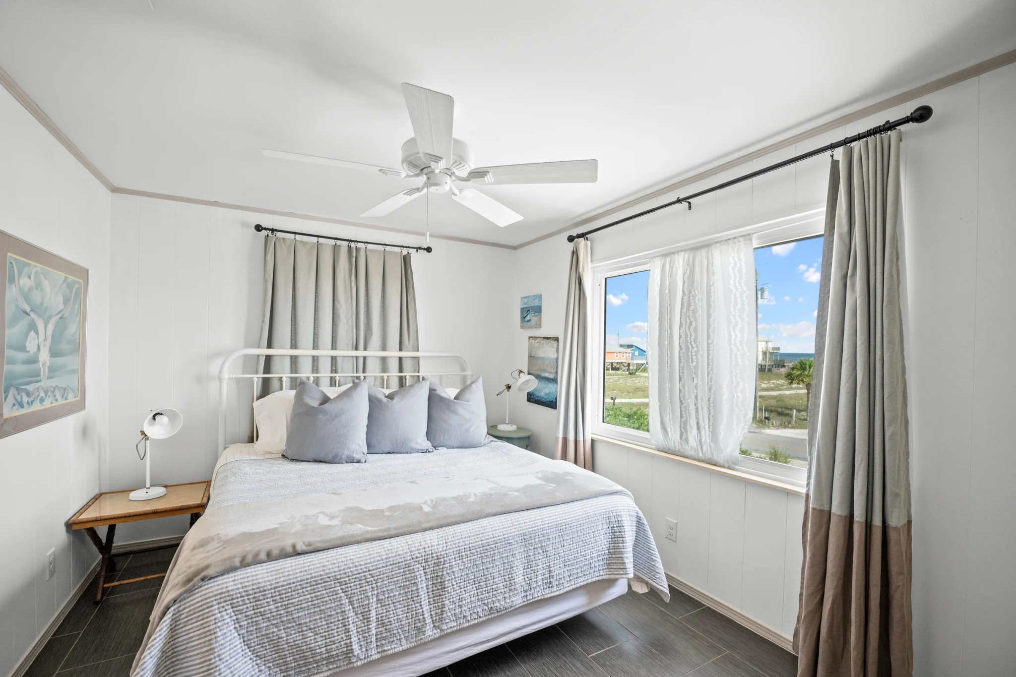 King bedroom with white iron bed, Sea Forever