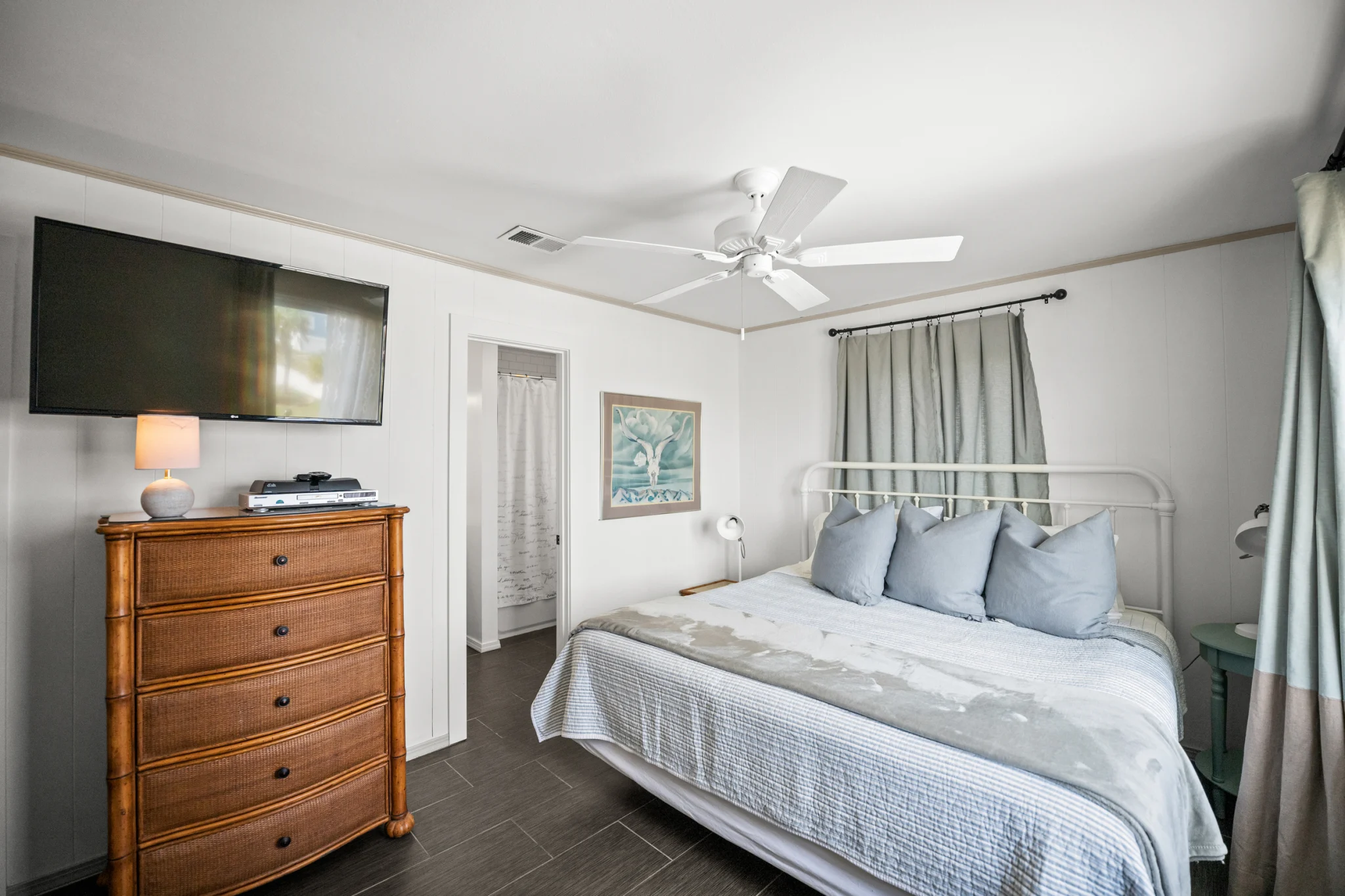 Bedroom with iron bed and TV, Sea Forever
