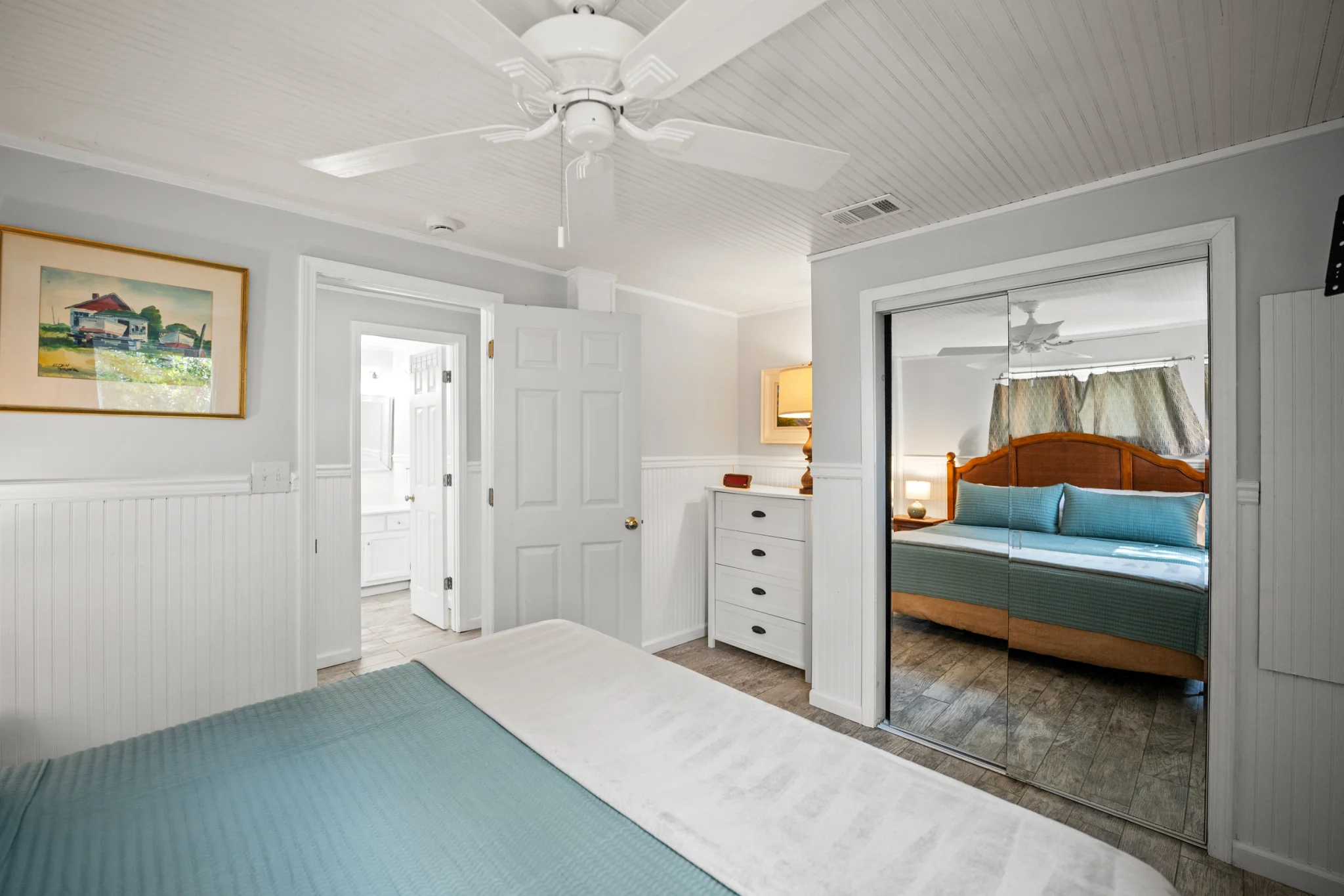 Bedroom with mirrored closet doors, Sea Forever