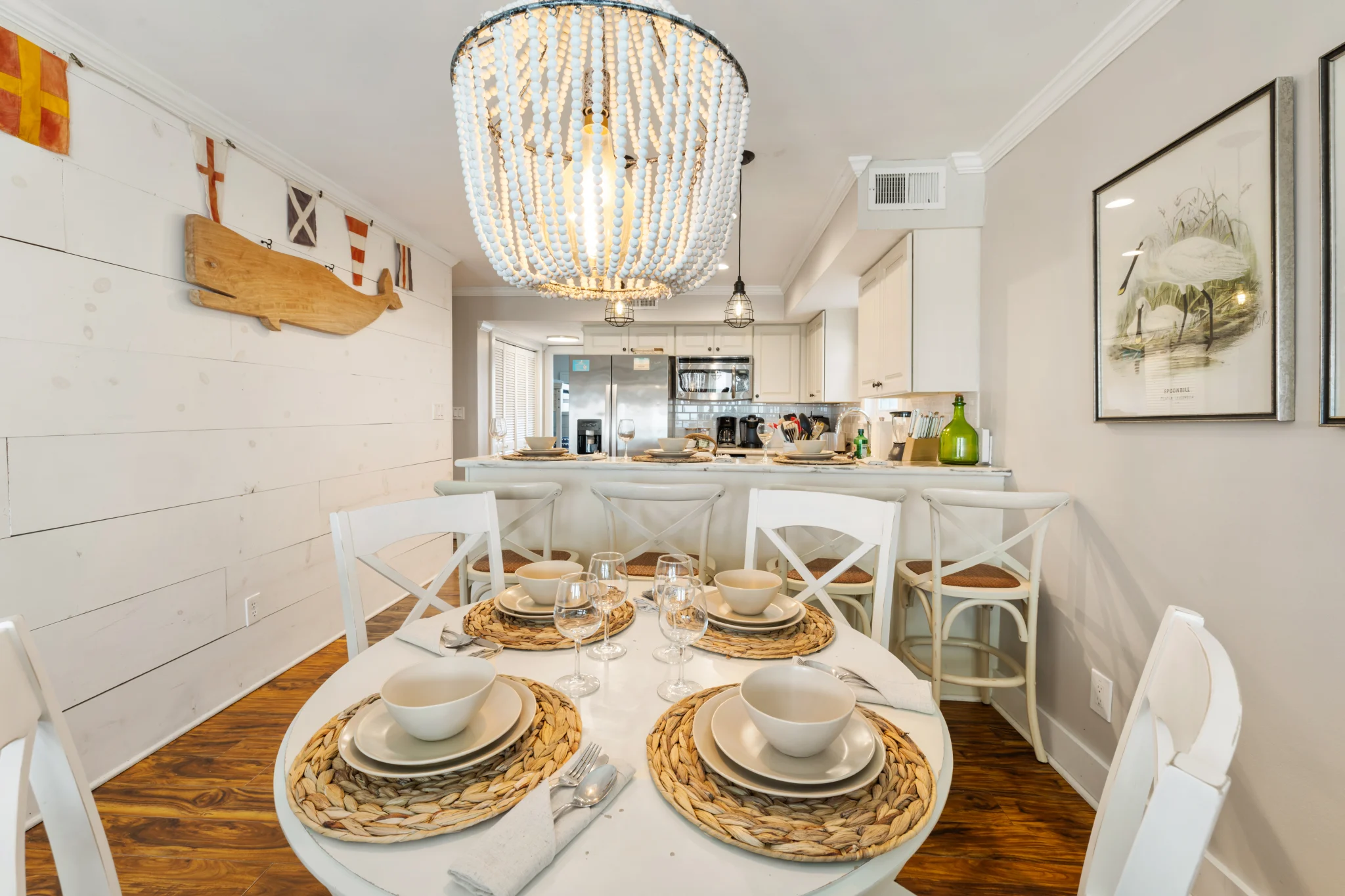 Dining table set for six beside the kitchen, SouthWind East