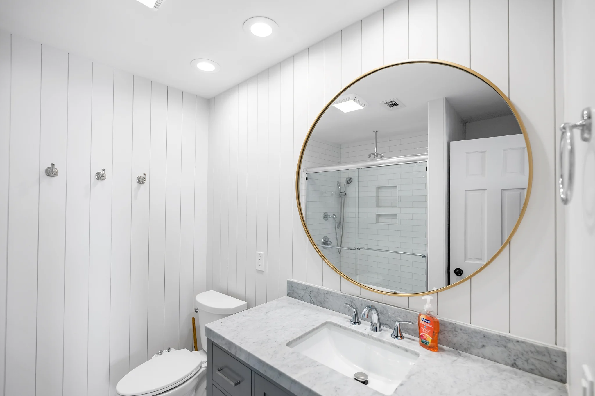 Bathroom vanity with round mirror, SouthWind East