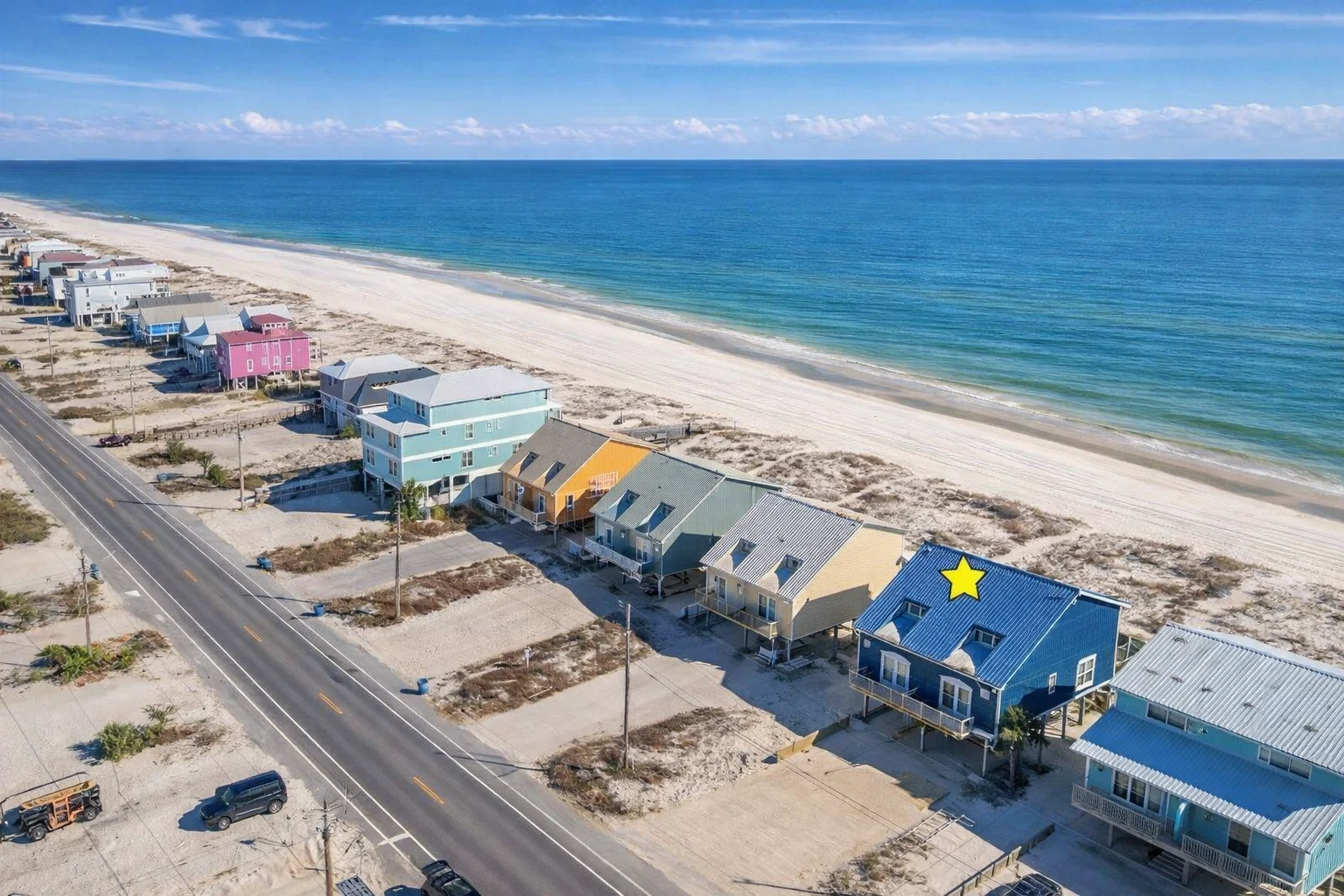 Beach road and shoreline from the air, the house marked with a star, SouthWind West
