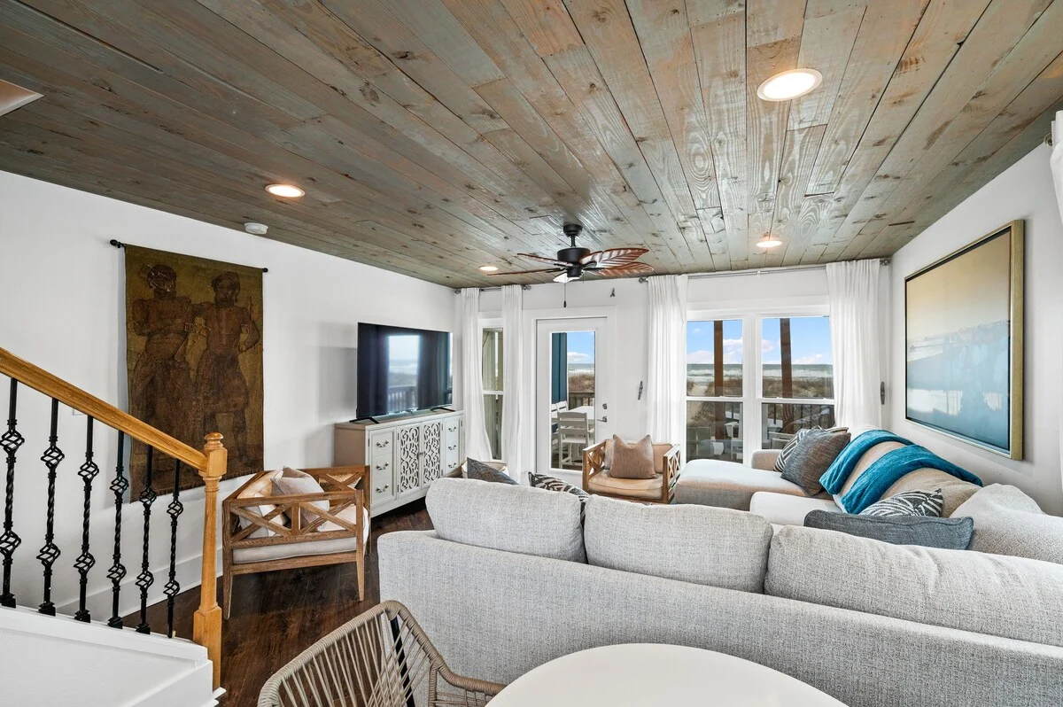 Living room with balcony doors and stair rail, SouthWind West