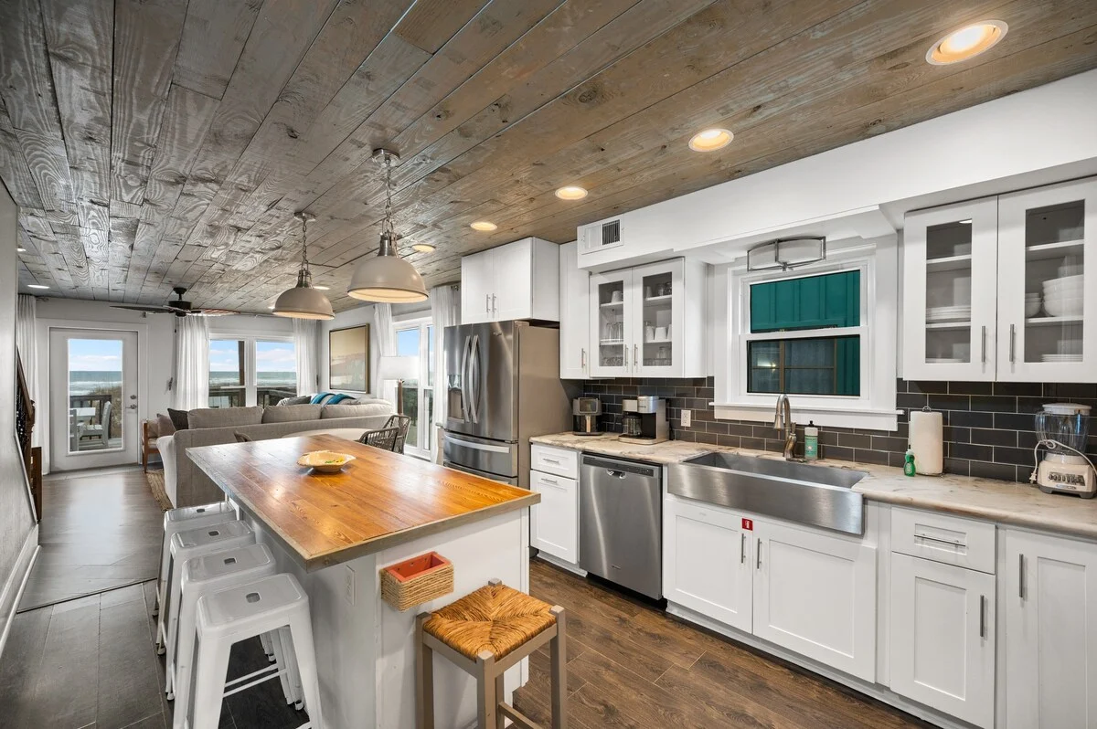Kitchen with butcher-block island and subway tile, SouthWind West
