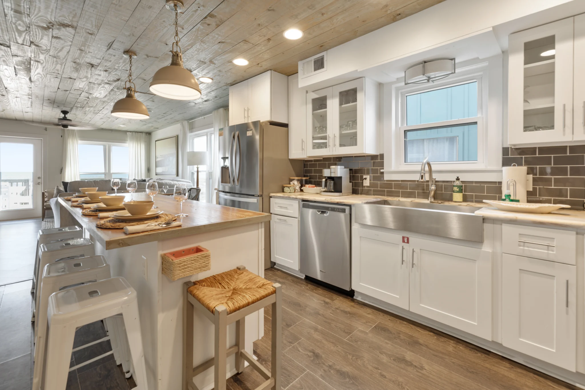 Island with stools and farmhouse sink, SouthWind West