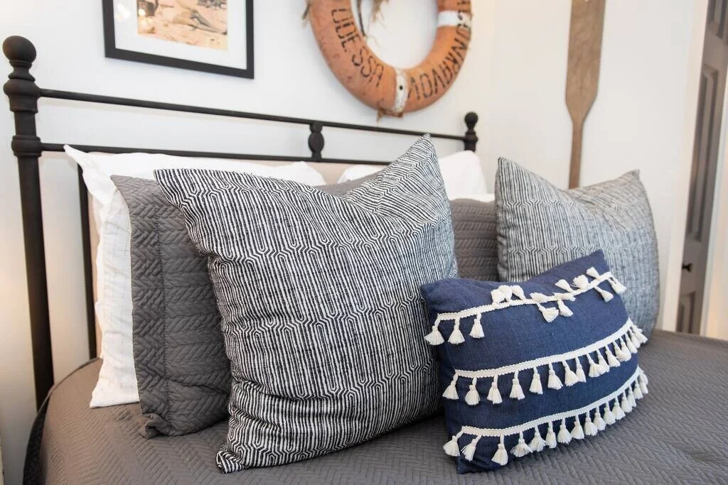 Throw pillows on the iron bed, SouthWind West