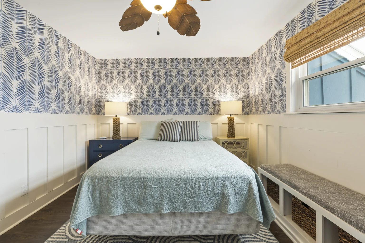 Queen bedroom with blue palm wallpaper, SouthWind West